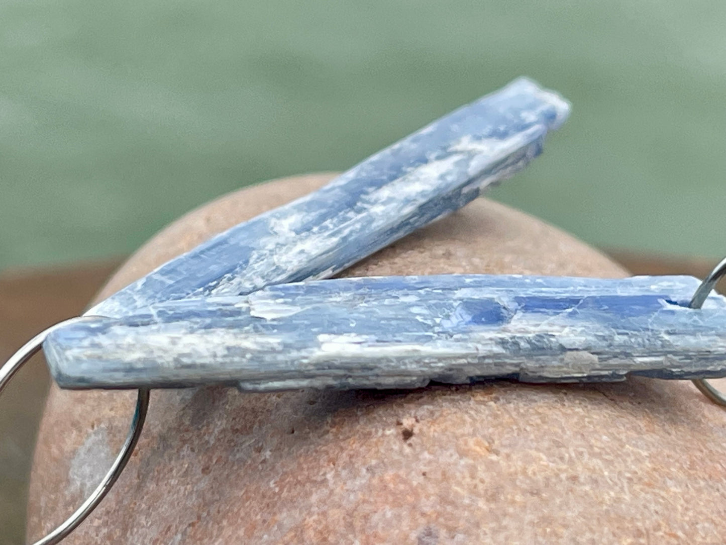 Blue kyanite earrings hung on recycled sterling silver. Angel wing earrings. Unique jewellery. handmade unusual jewellery, ethically made.