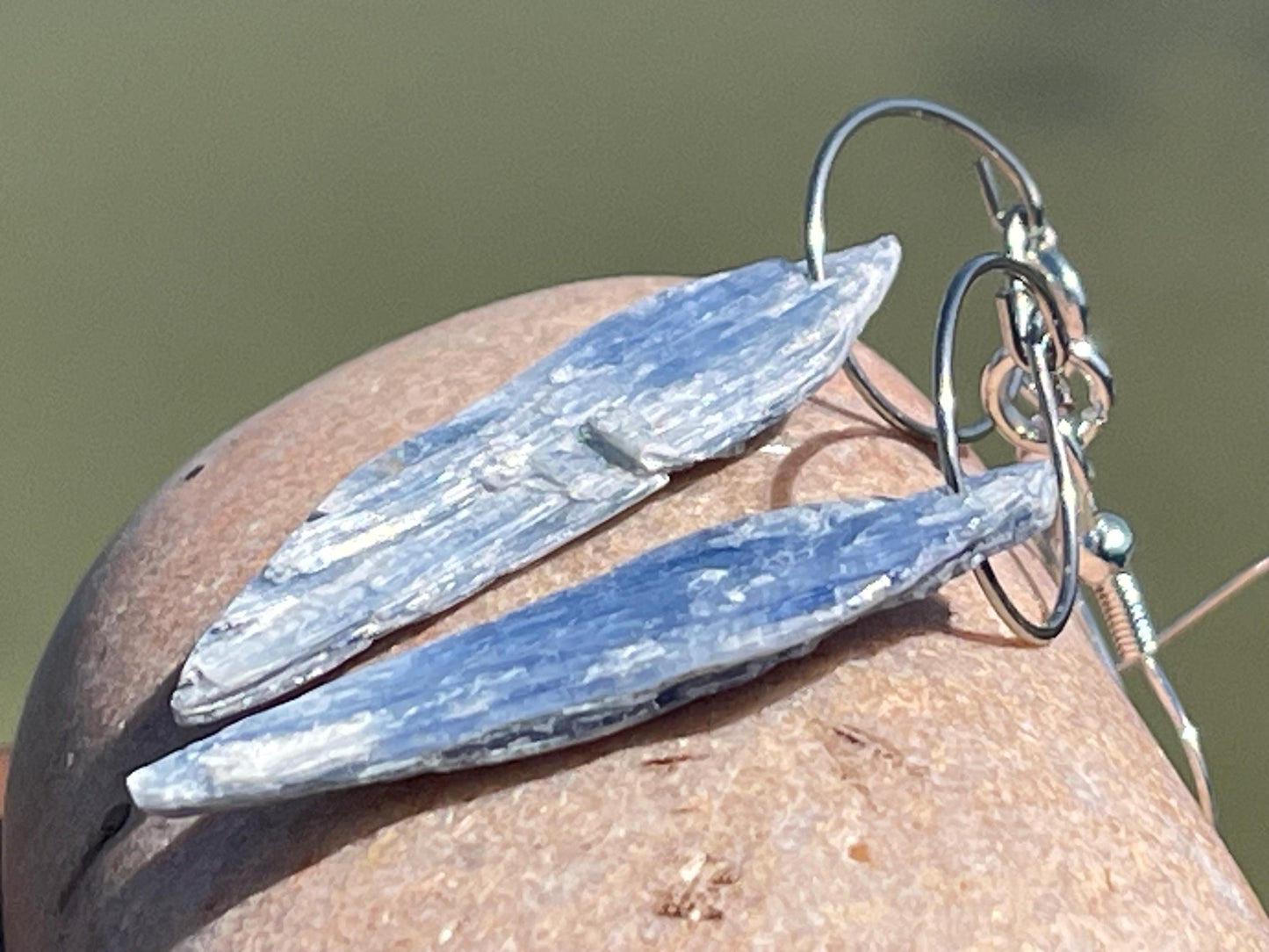 Blue kyanite earrings hung on recycled sterling silver. Angel wing earrings. Unique jewellery. handmade unusual jewellery, ethically made.
