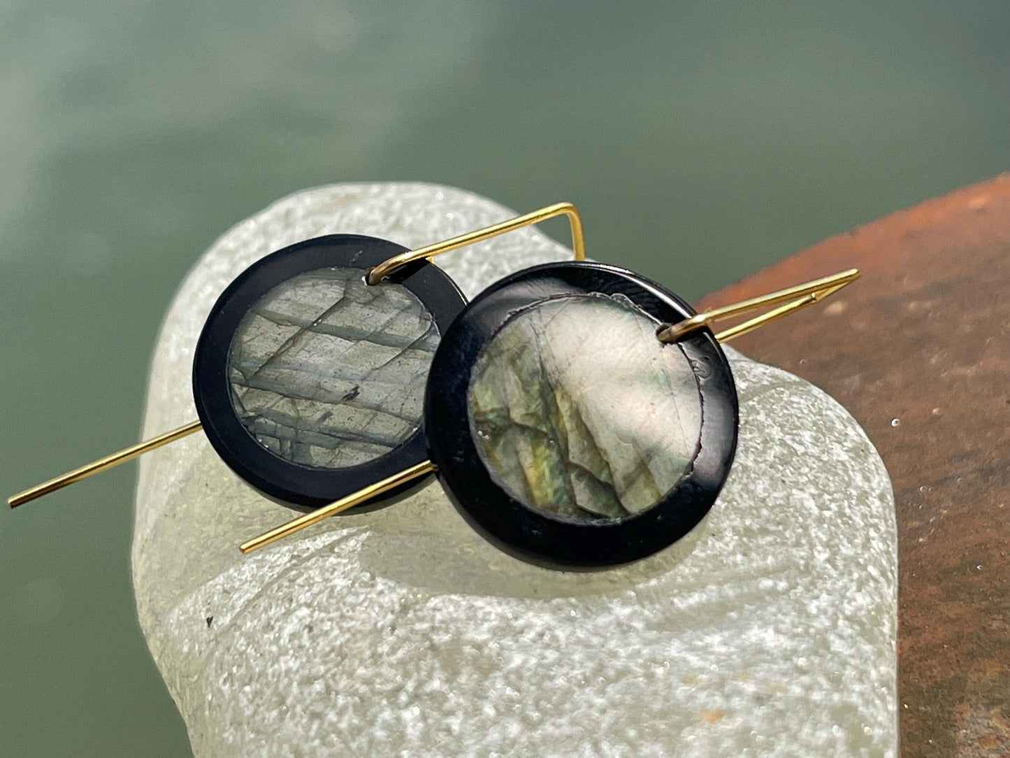 Ethically sourced labradorite and black onyx earrings held on recycled brass. Ethical jewellery, labradorite jewellery. Boho unique earrings