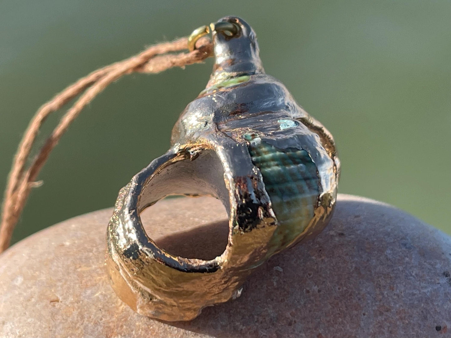 Large painted gold shell necklace held on recycled brass and sustainable hemp. Shell jewellery. Boho jewellery. Eco friendly gifts.