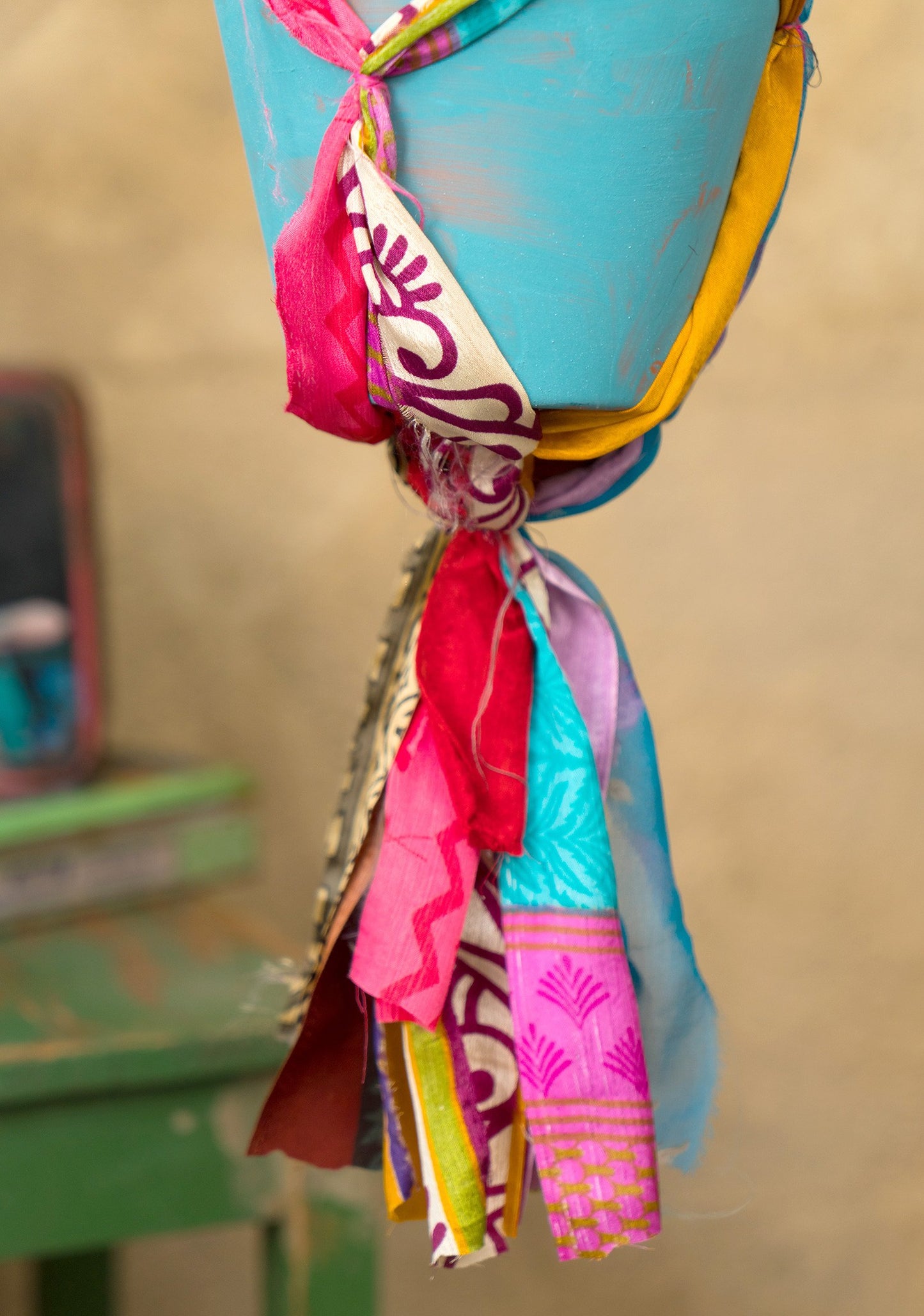 Hanging plant holder made from recycled saris. Eco friendly plant hanger. Colourful home decor.