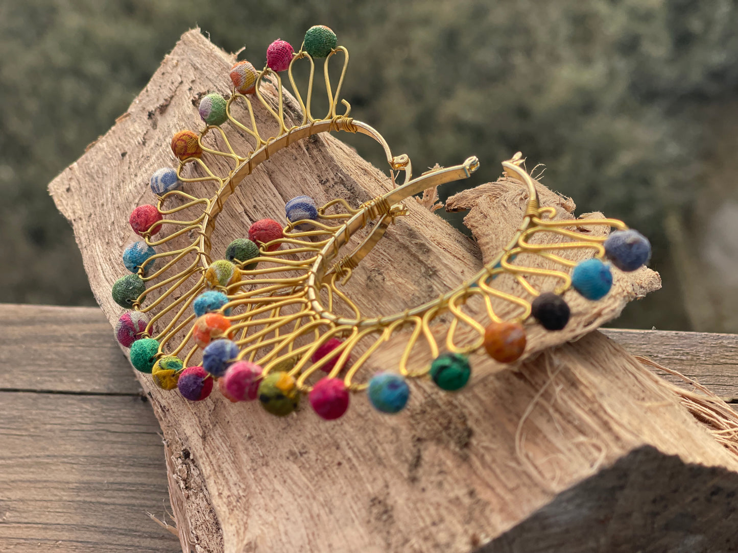 Handmade earrings made from waste textiles