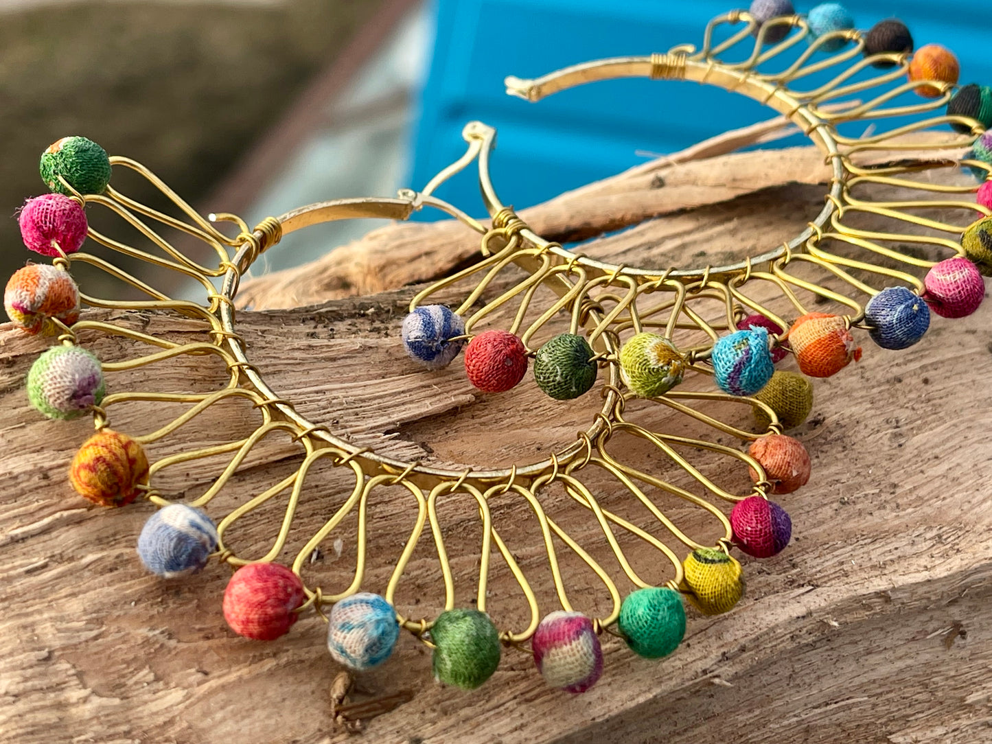 Handmade earrings made from waste textiles