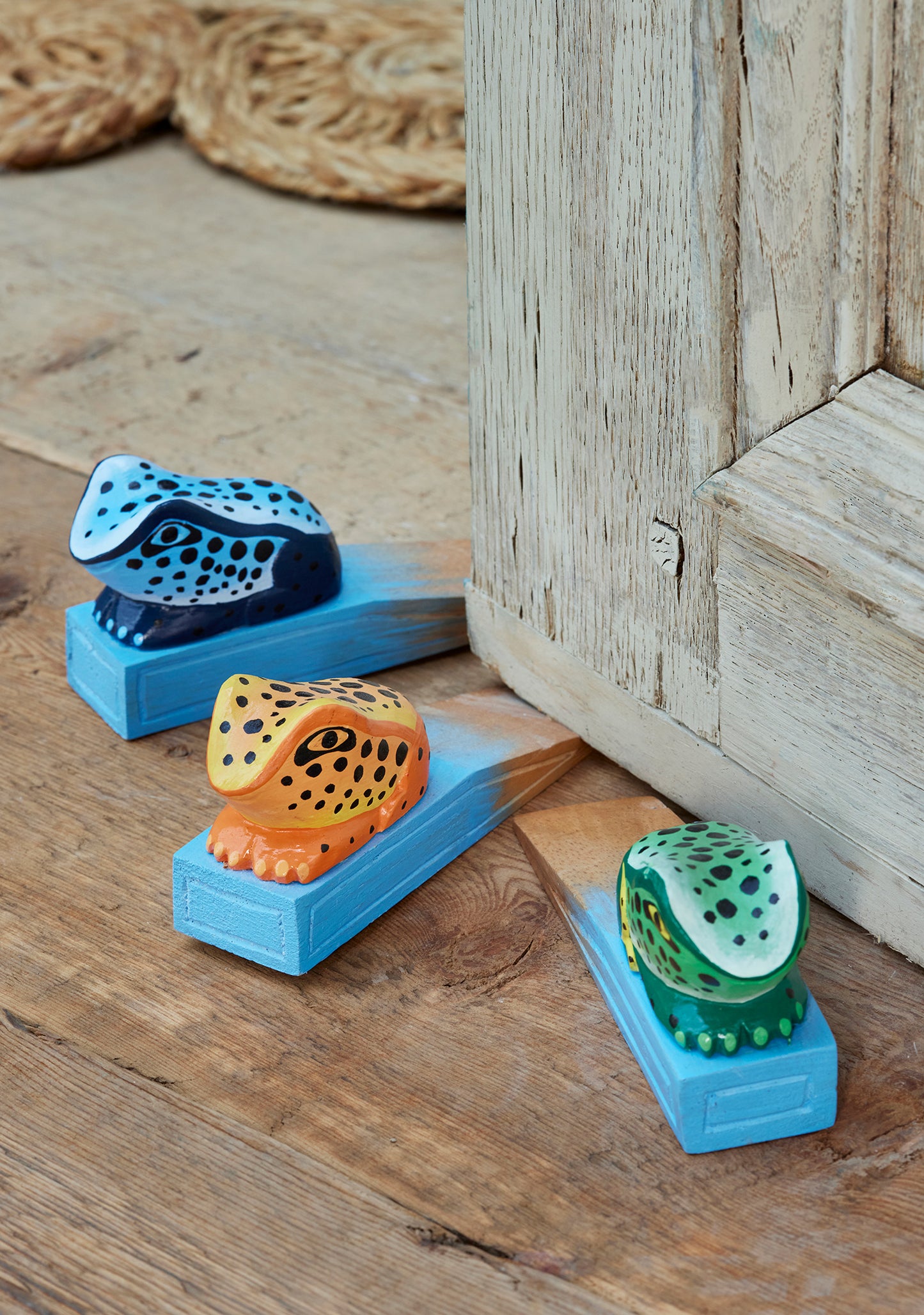Frog door stop made from sustainable painted wood. Fun animal doorstop. Ethical gift ideas. Frog door stoppers.