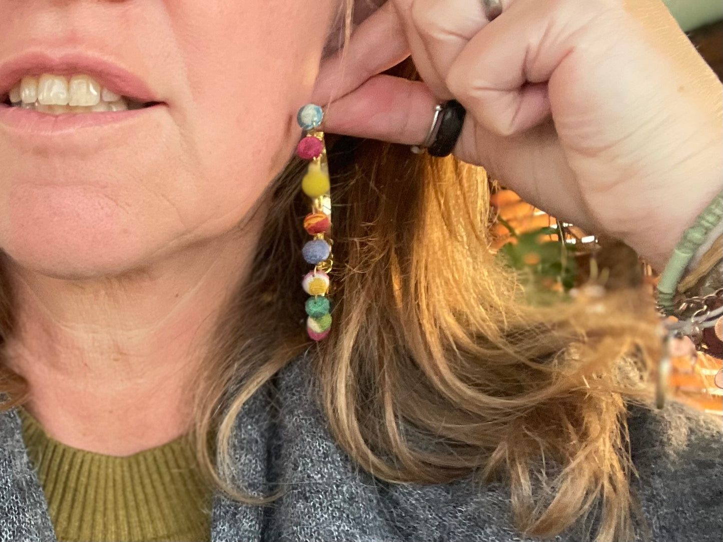 Handmade earrings made from waste textiles