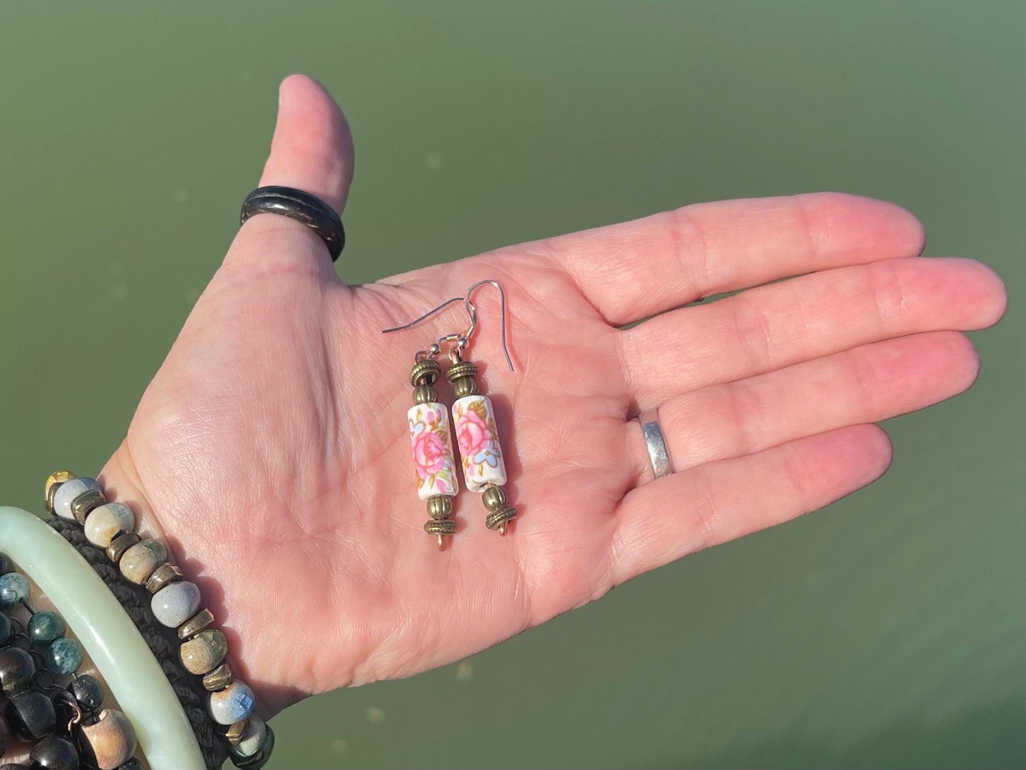Eco friendly earrings made from vintage beads and recycled copper. Hypoallergenic rose gold ear hooks. Ethical handmade jewellery.