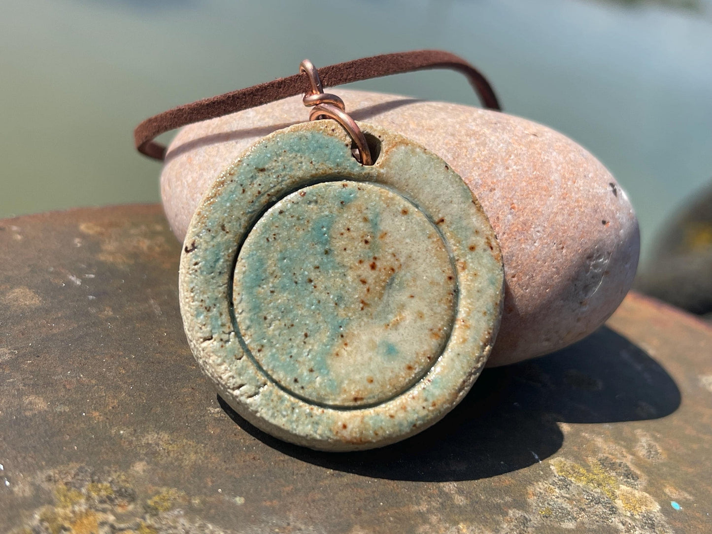 Eco friendly jewellery. Ethical pendants made with waste Sussex clay and recycled copper. Ethical jewellery. Large rustic pendant.