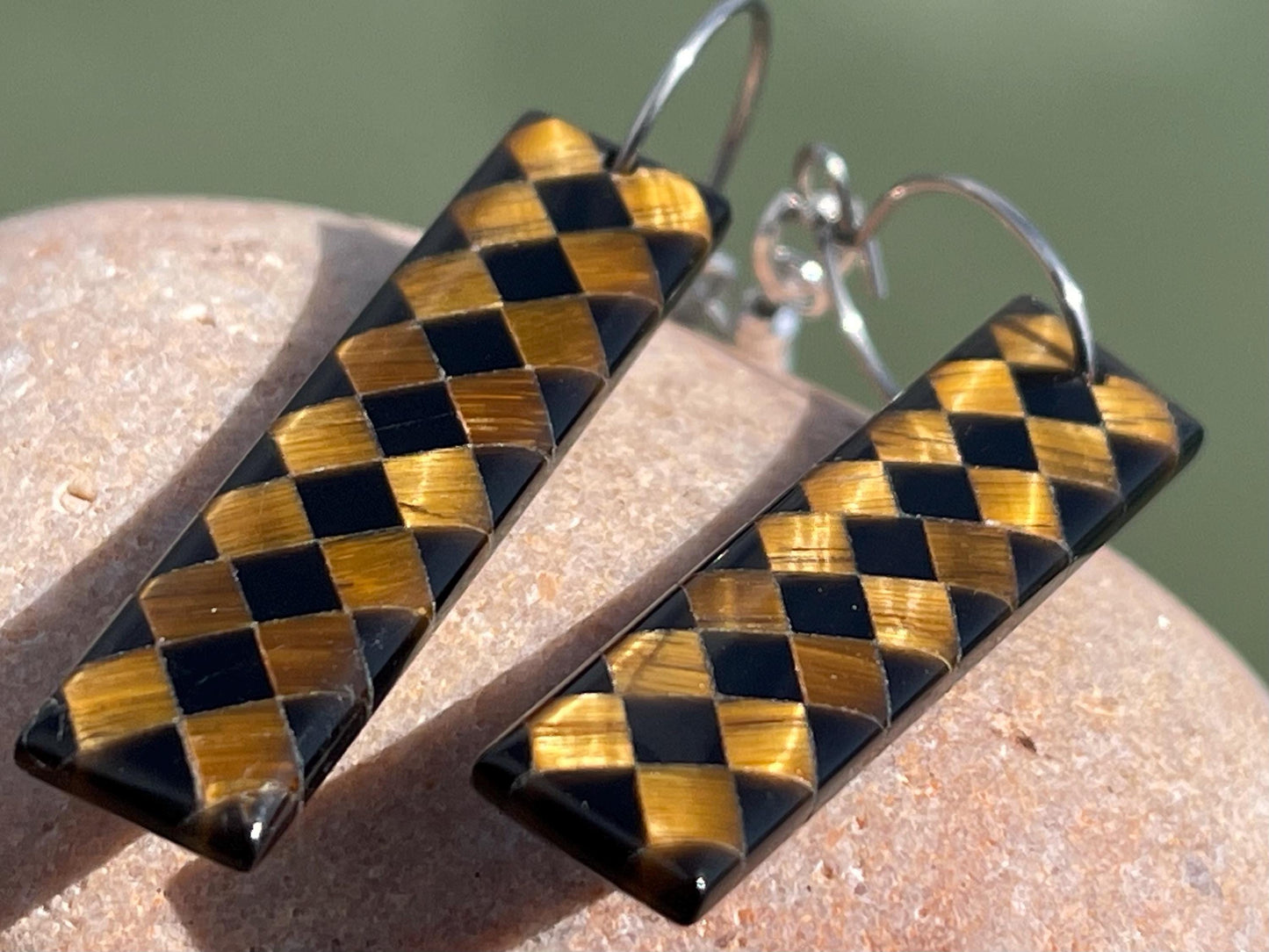 Obsidian and tigers eye gemstone earrings on sterling silver. Ethical and unique jewellery. Unique handmade earrings.