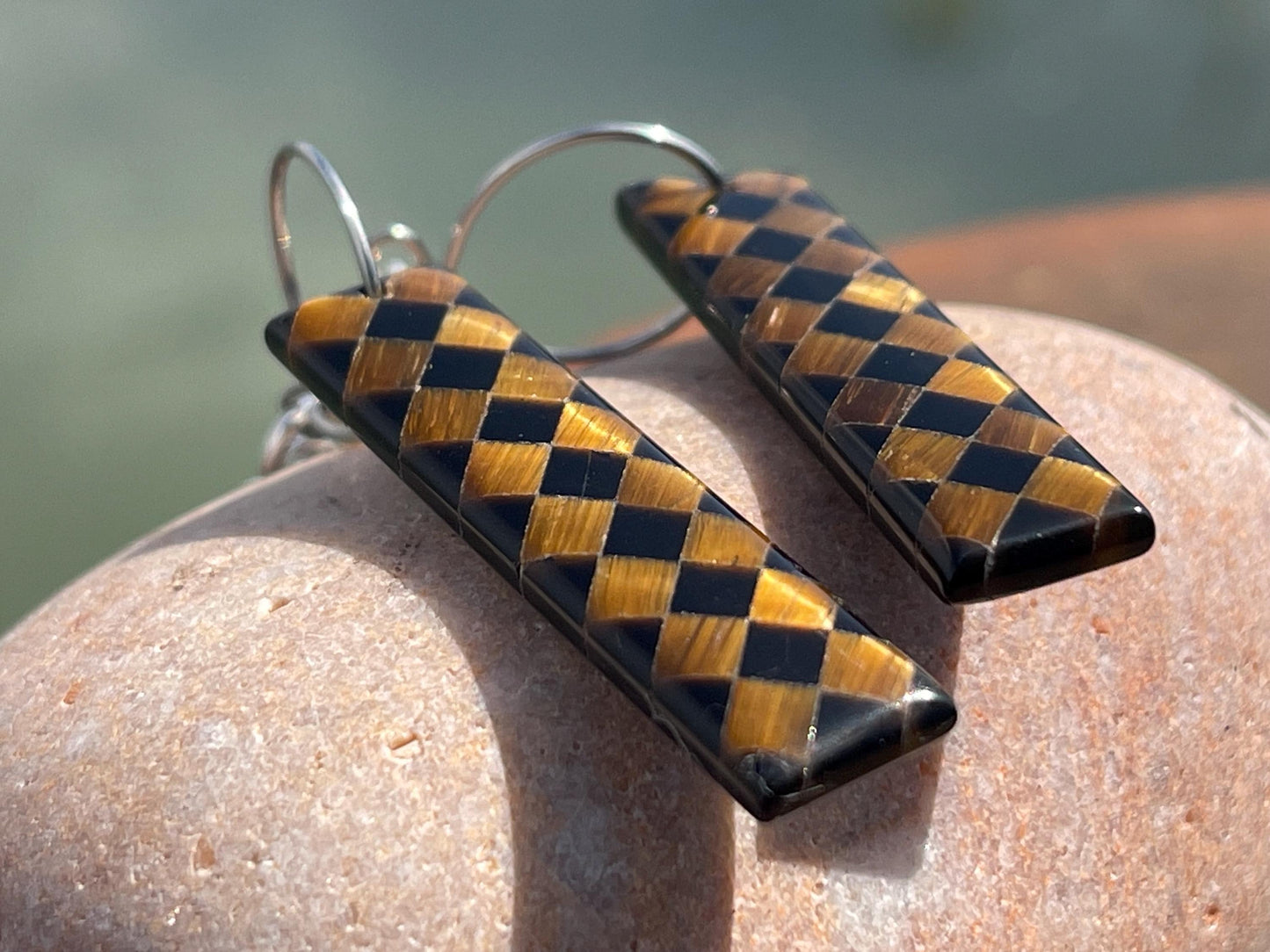 Obsidian and tigers eye gemstone earrings on sterling silver. Ethical and unique jewellery. Unique handmade earrings.