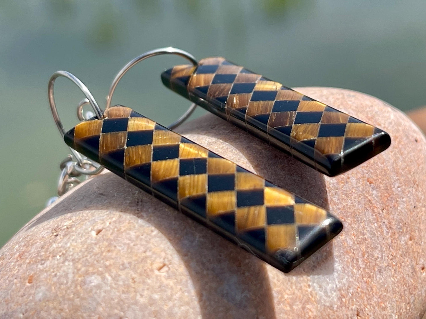 Obsidian and tigers eye gemstone earrings on sterling silver. Ethical and unique jewellery. Unique handmade earrings.