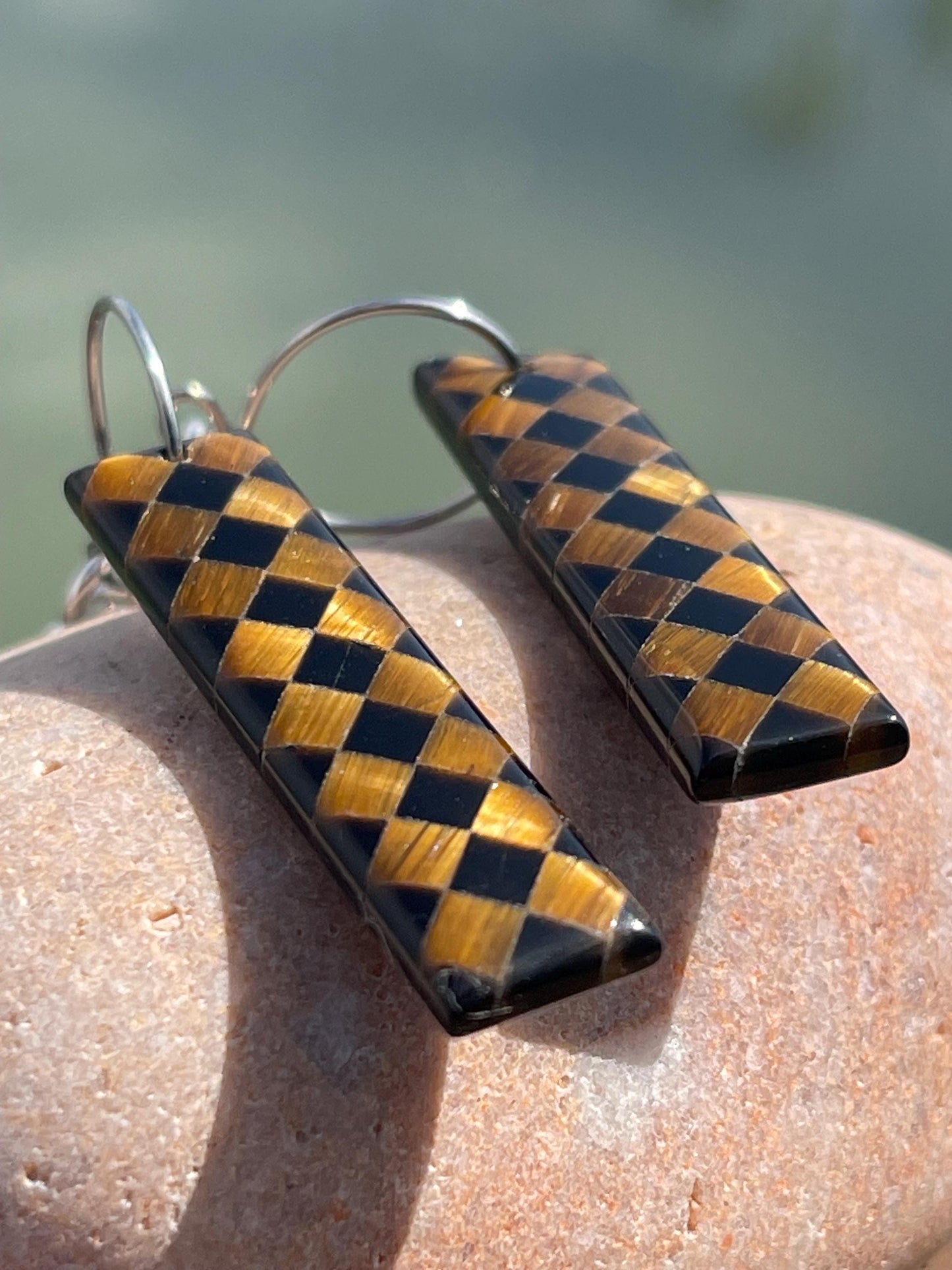 Obsidian and tigers eye gemstone earrings on sterling silver. Ethical and unique jewellery. Unique handmade earrings.