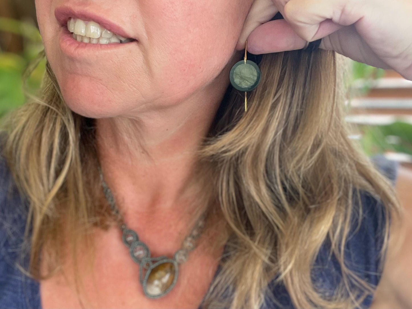 Ethically sourced labradorite and black onyx earrings held on recycled brass. Ethical jewellery, labradorite jewellery. Boho unique earrings