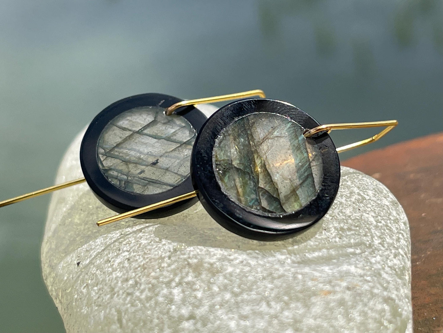 Ethically sourced labradorite and black onyx earrings held on recycled brass. Ethical jewellery, labradorite jewellery. Boho unique earrings