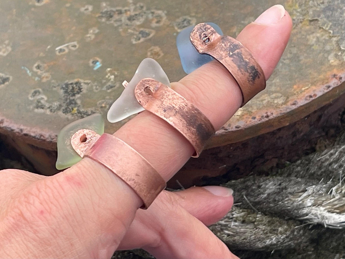 Recycled copper and sea glass rings. Handmade sea glass jewellery. Rings made with sea glass. Rustic jewellery. Handmade unusual rings.