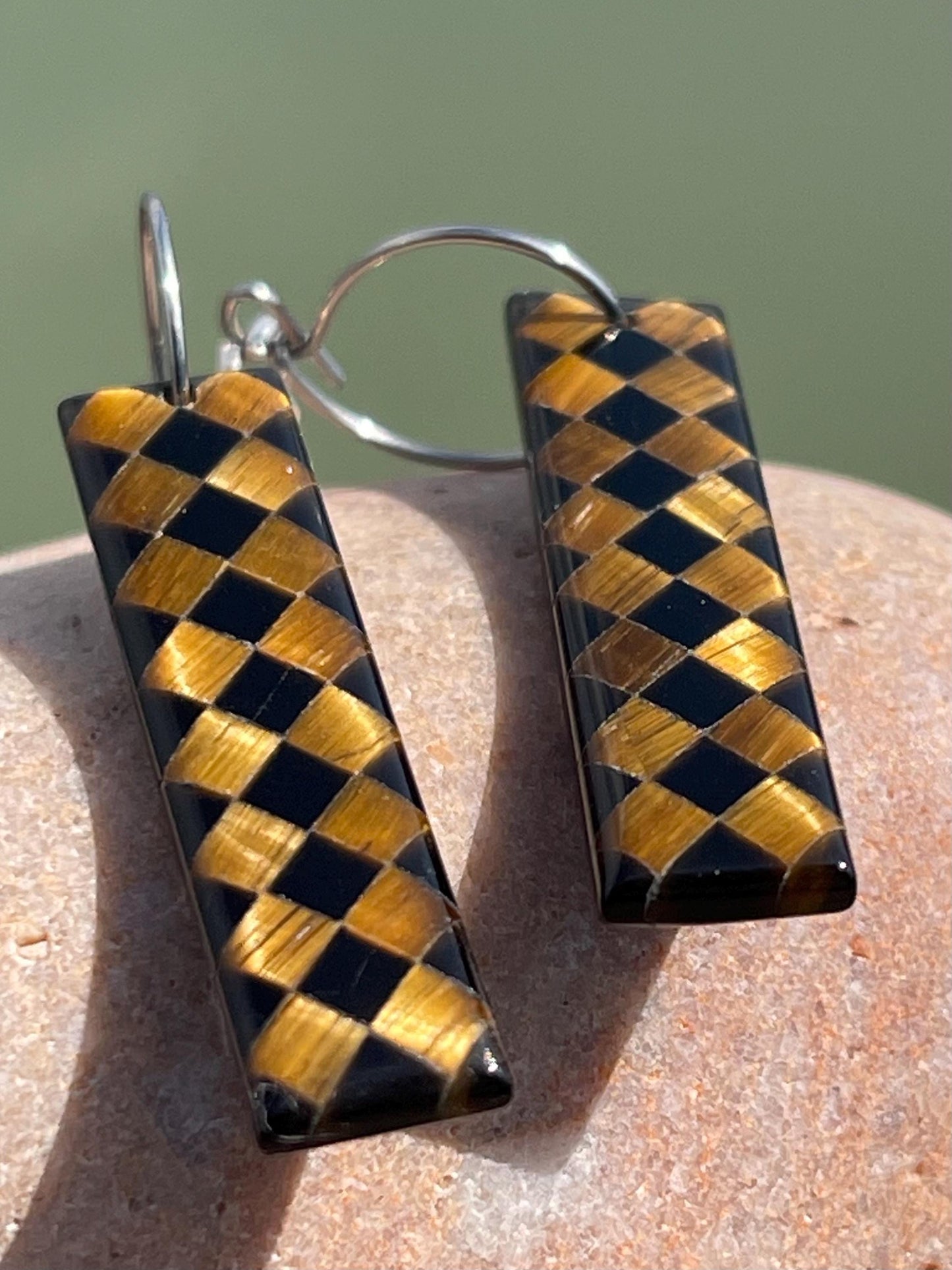 Obsidian and tigers eye gemstone earrings on sterling silver. Ethical and unique jewellery. Unique handmade earrings.