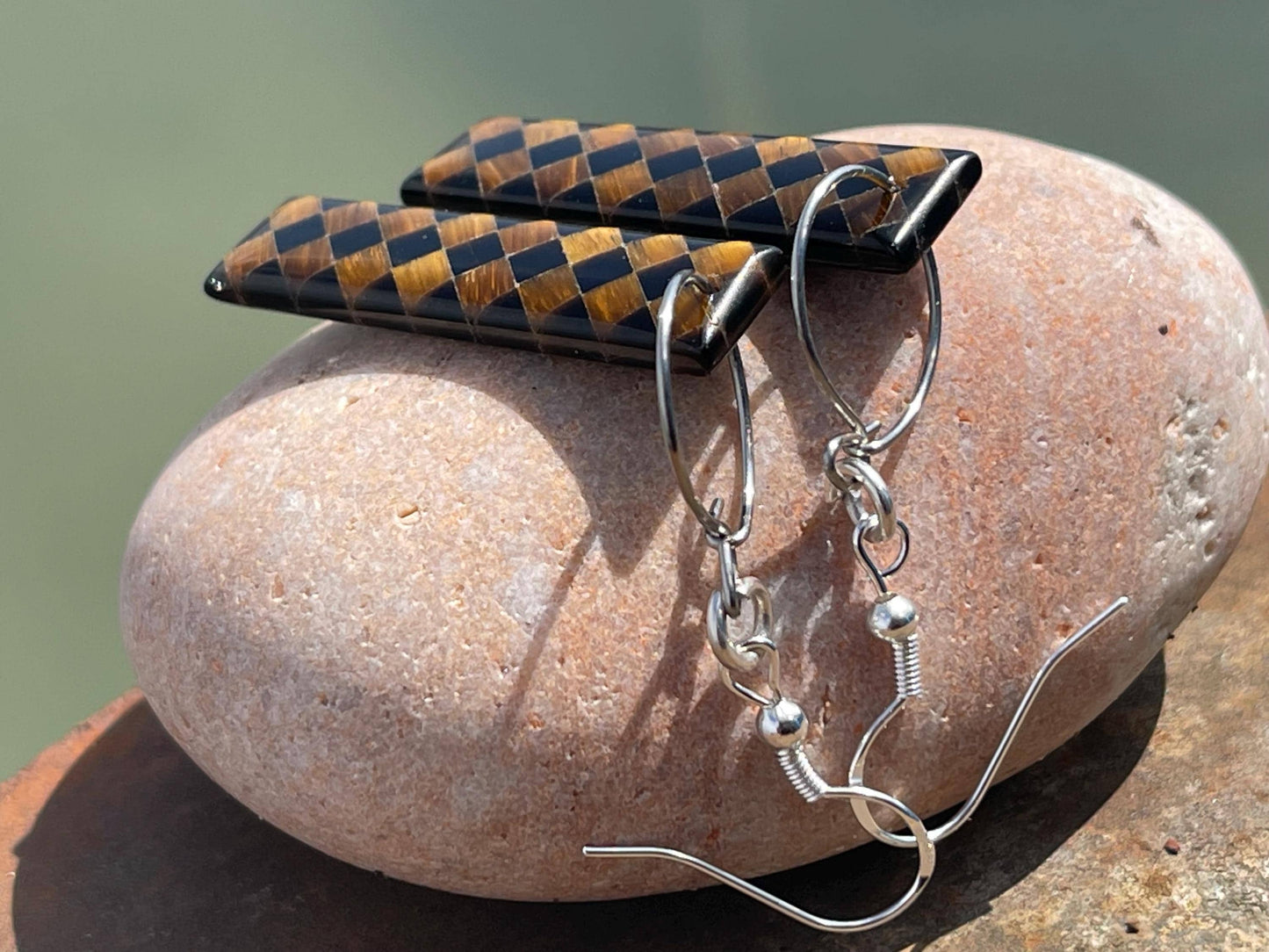 Obsidian and tigers eye gemstone earrings on sterling silver. Ethical and unique jewellery. Unique handmade earrings.