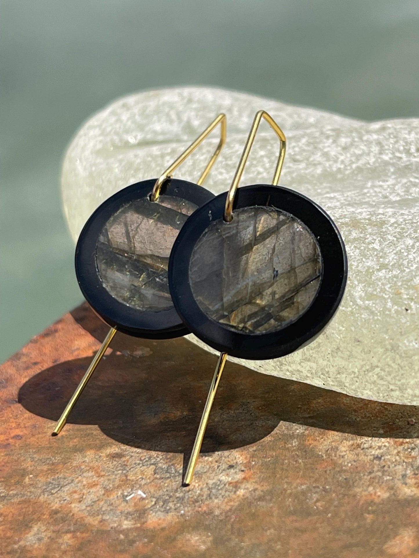 Ethically sourced labradorite and black onyx earrings held on recycled brass. Ethical jewellery, labradorite jewellery. Boho unique earrings