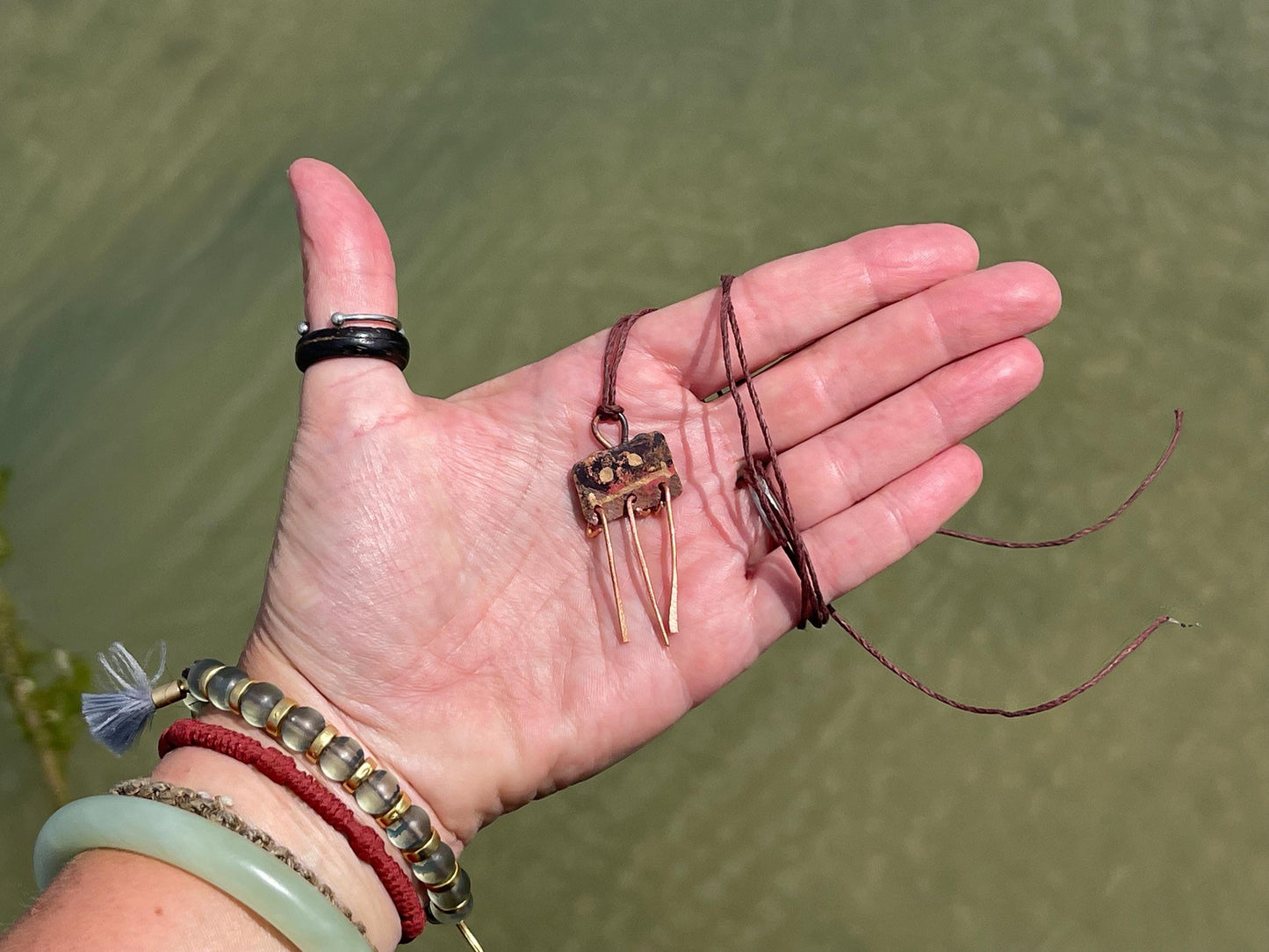 Robot necklace made with welded off-cuts of copper. Handmade jewellery, unique boho jewellery, ethical jewellery. Robot pendant.