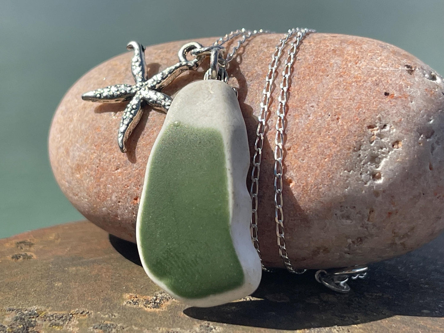 Eco friendly sea ceramic necklace on a sterling silver chain showcasing a little starfish pendant, starfish necklace, ethical jewellery