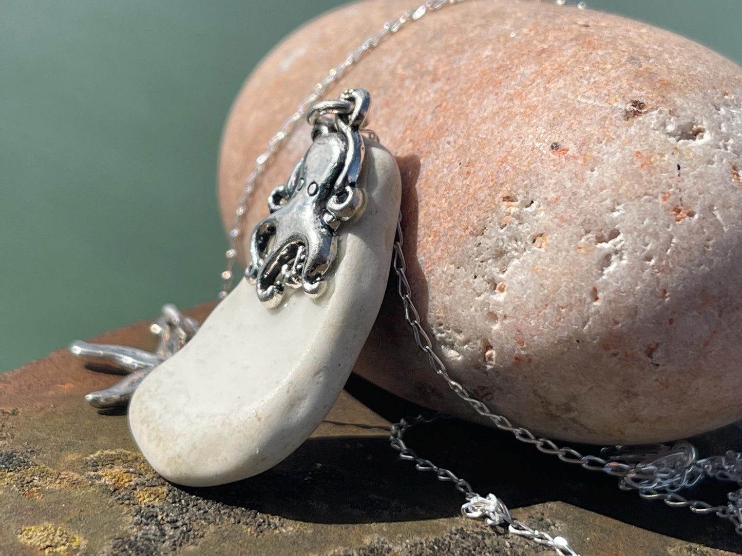Eco friendly sea ceramic necklace on a sterling silver chain showcasing a little starfish pendant, starfish necklace, ethical jewellery