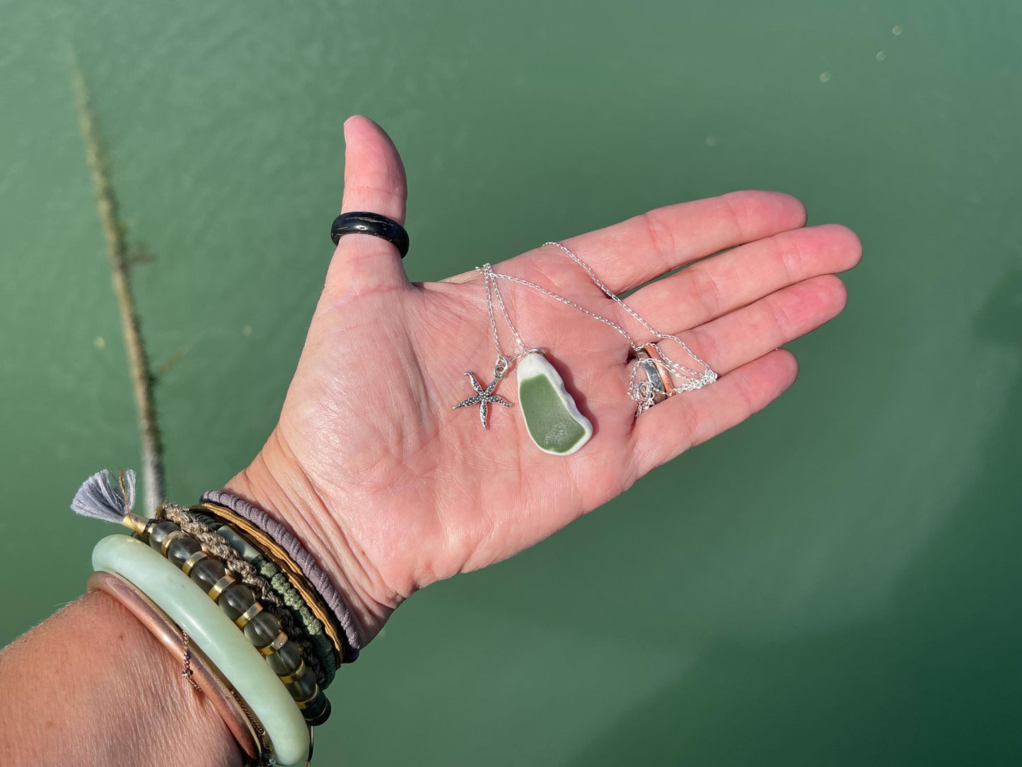 Eco friendly sea ceramic necklace on a sterling silver chain showcasing a little starfish pendant, starfish necklace, ethical jewellery