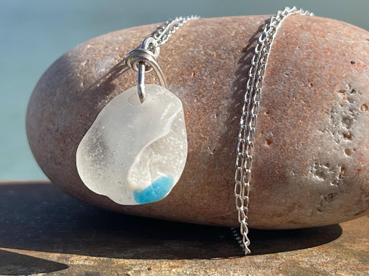 Eco friendly sea glass necklace on a sterling silver chain showcasing a little octopus. Octopus pendant, octopus necklace, ethical jewellery