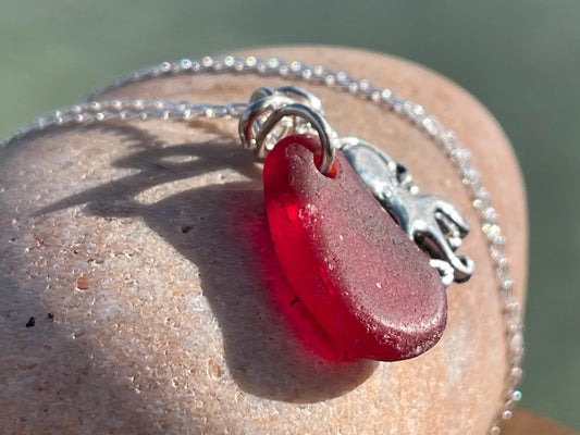 Eco friendly sea glass necklace on a sterling silver chain showcasing a little octopus. Octopus pendant, octopus necklace, ethical jewellery