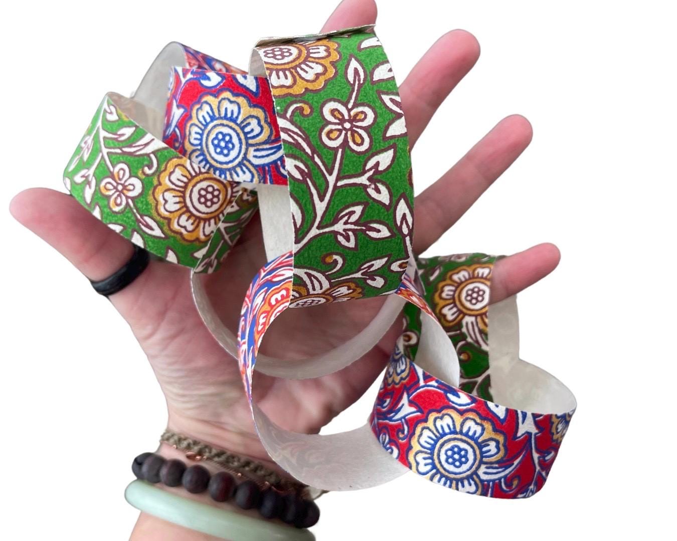 Recycled paper chains. Hand printed paper chains for parties and special occasions. Great family activity. Eco friendy paper garlands.