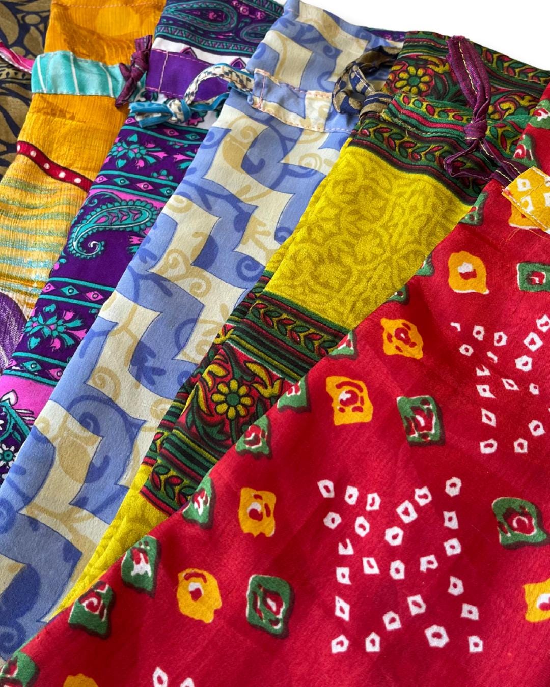 4 recycled sari bottle bags. Eco friendly bottle bags. Recycled bags for gifts. Recycled gift bags. Ethical draw string bags. Wine bags.