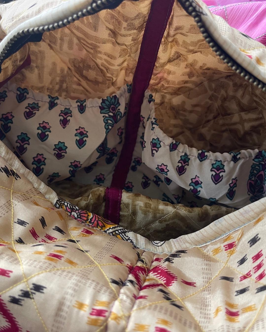 Large zip up recycled wash bag with 4 internal pockets. Wide range of colours. Made from recycled saris. Eco friendly wash bags.