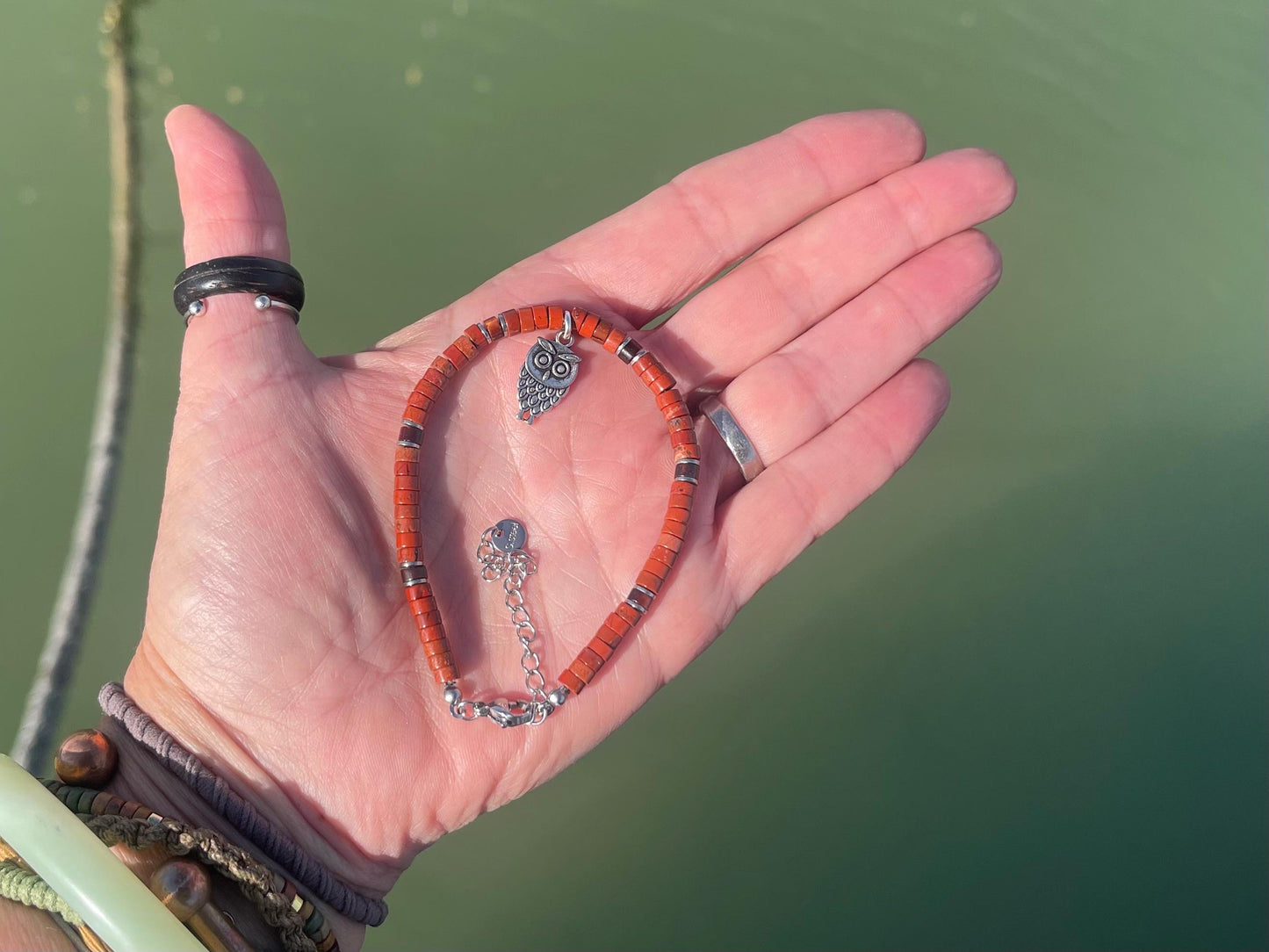 Adjustable red jasper gemstone bracelet, handmade gift for him or her. Ethical jewellery, unique jewellery. Owl bracelet. Owl jewellery.
