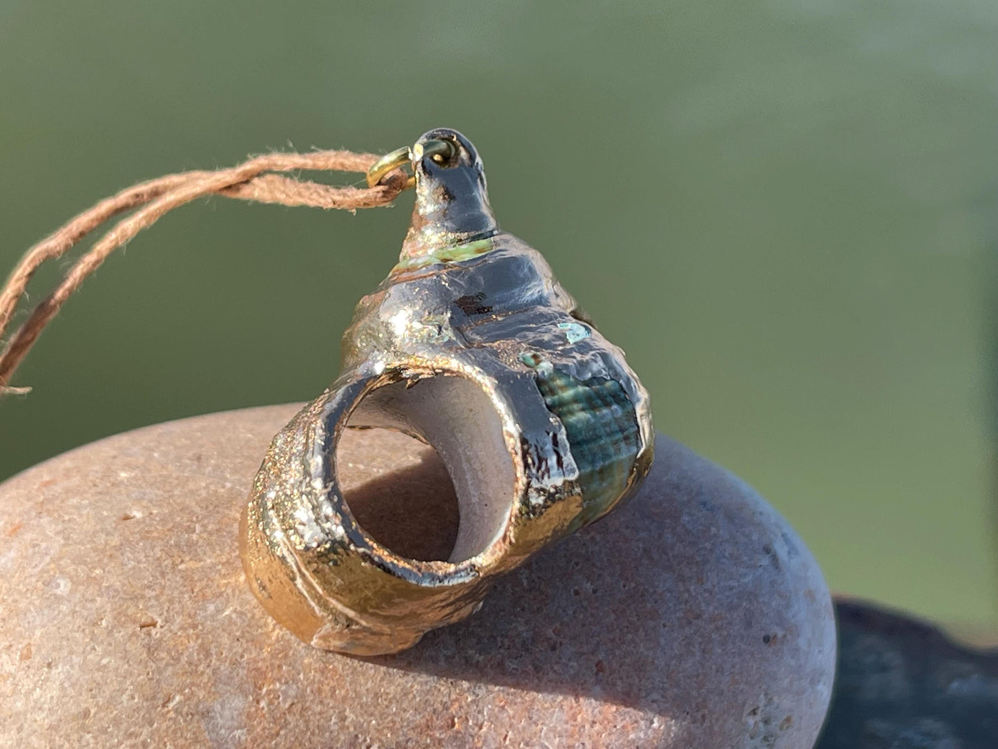 Large painted gold shell necklace held on recycled brass and sustainable hemp. Shell jewellery. Boho jewellery. Eco friendly gifts.