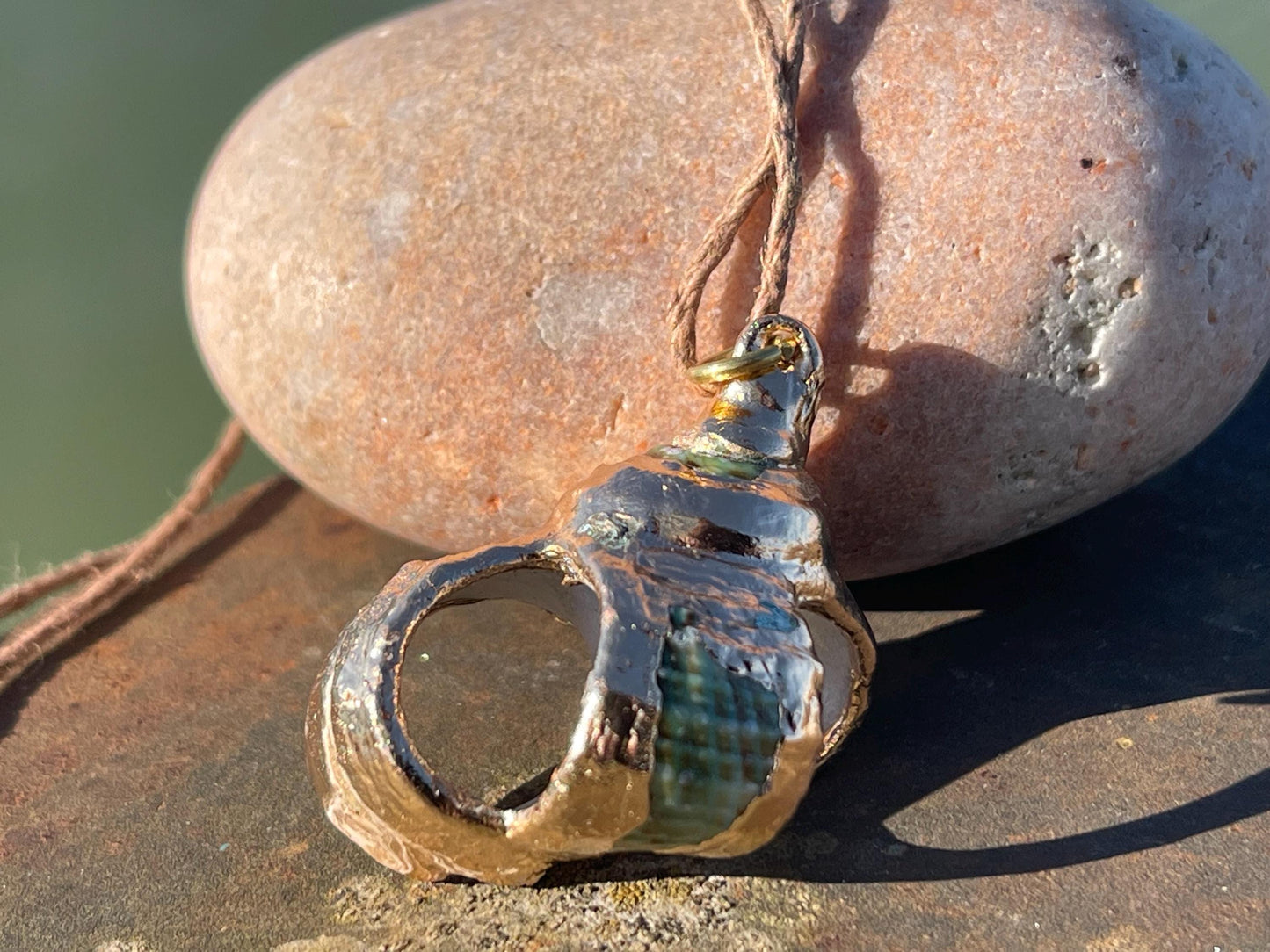 Large painted gold shell necklace held on recycled brass and sustainable hemp. Shell jewellery. Boho jewellery. Eco friendly gifts.