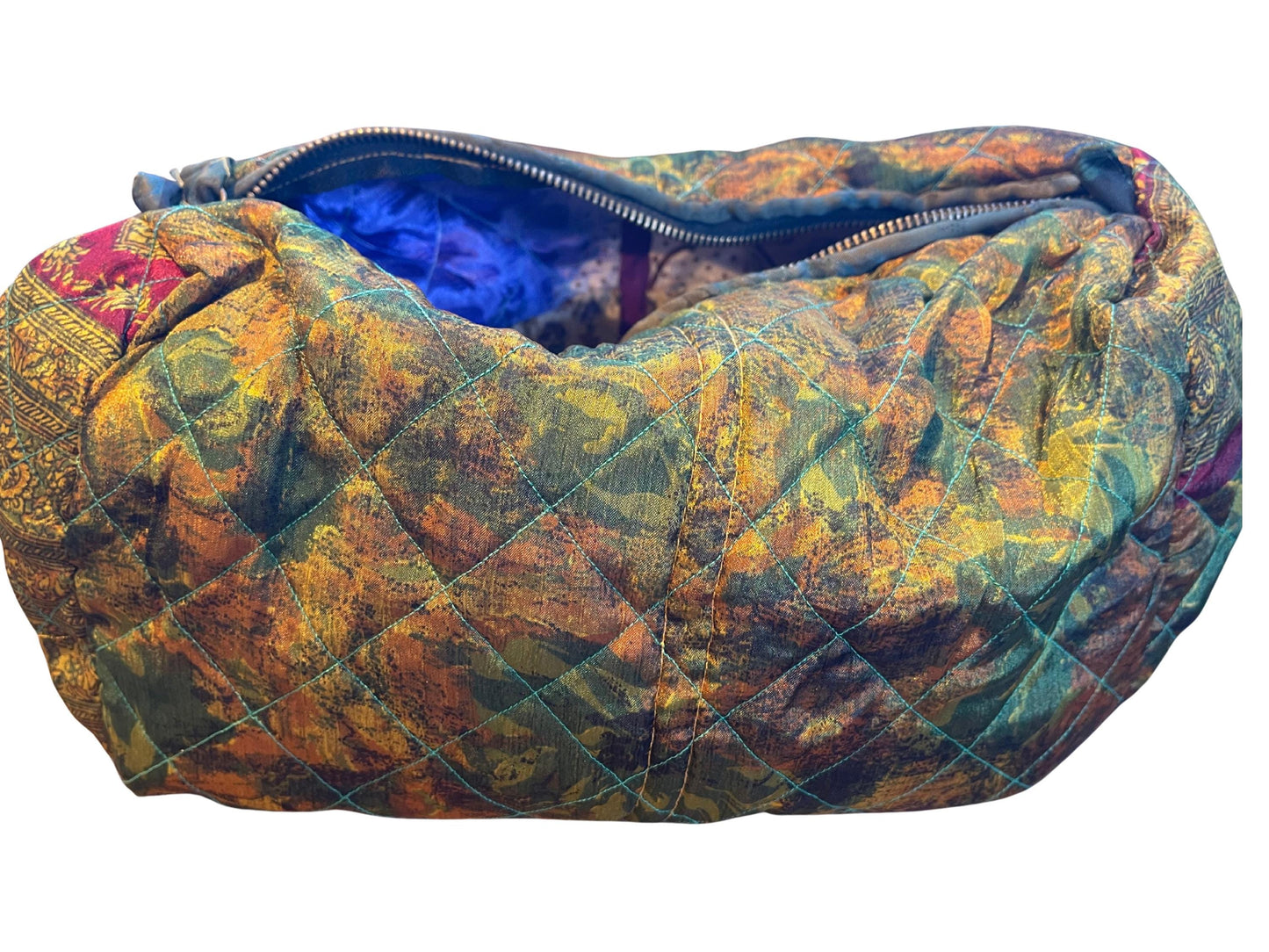 Large zip up recycled wash bag with 4 internal pockets. Wide range of colours. Made from recycled saris. Eco friendly wash bags.