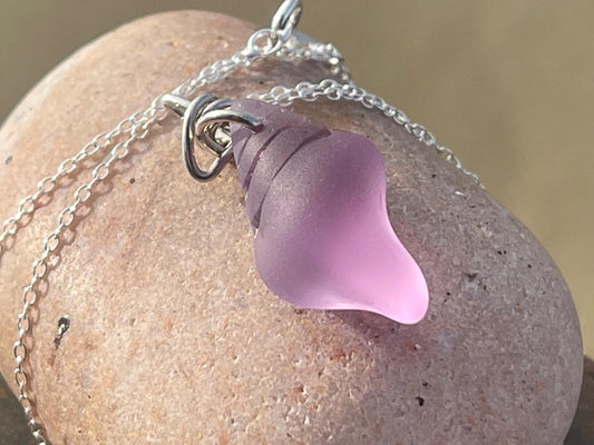Eco friendly glass necklace on a sterling silver chain showcasing a pink shell pendant. Eco friendly jewellery. Ethical handmade jewellery