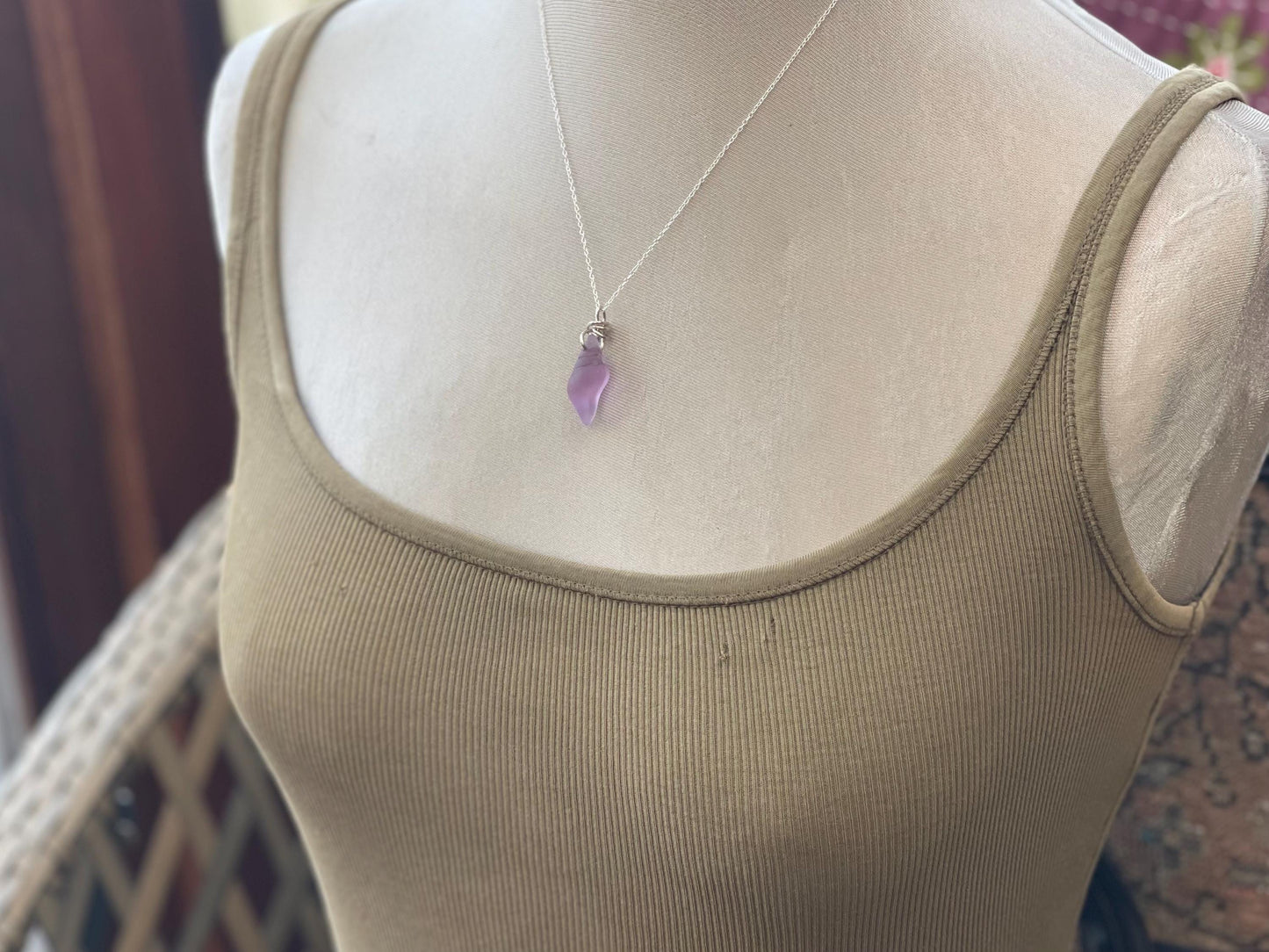 Eco friendly glass necklace on a sterling silver chain showcasing a pink shell pendant. Eco friendly jewellery. Ethical handmade jewellery