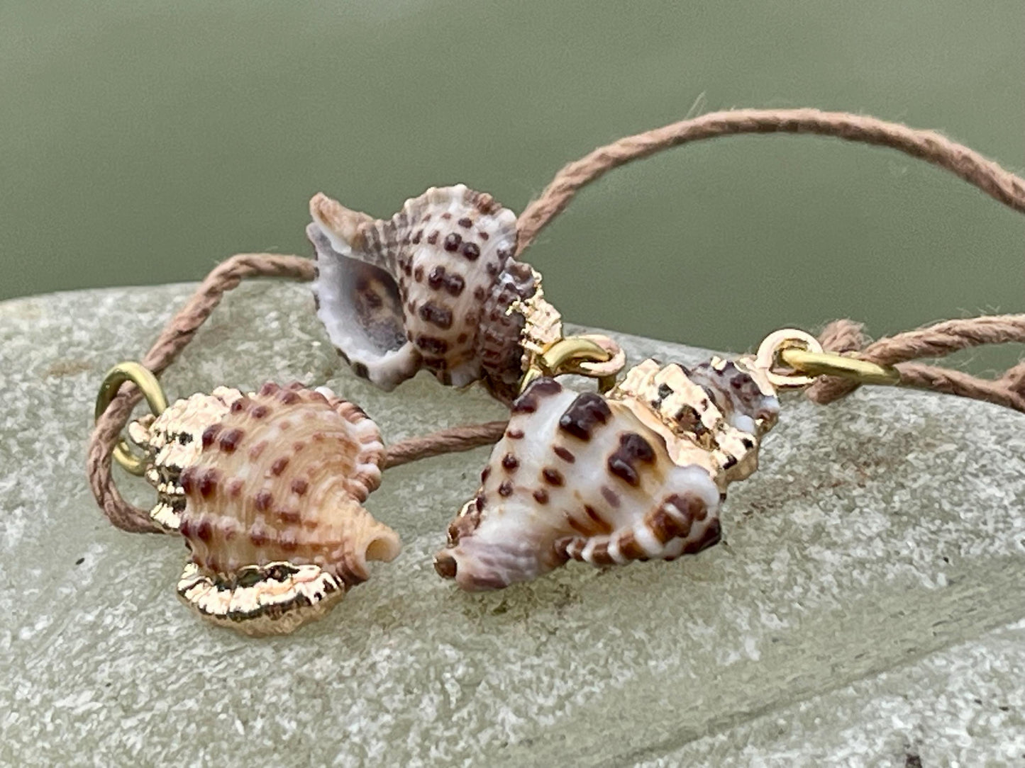 Pretty little painted gold shell necklace held on recycled brass and sustainable hemp. Shell jewellery. Boho jewellery. Eco friendly gifts.