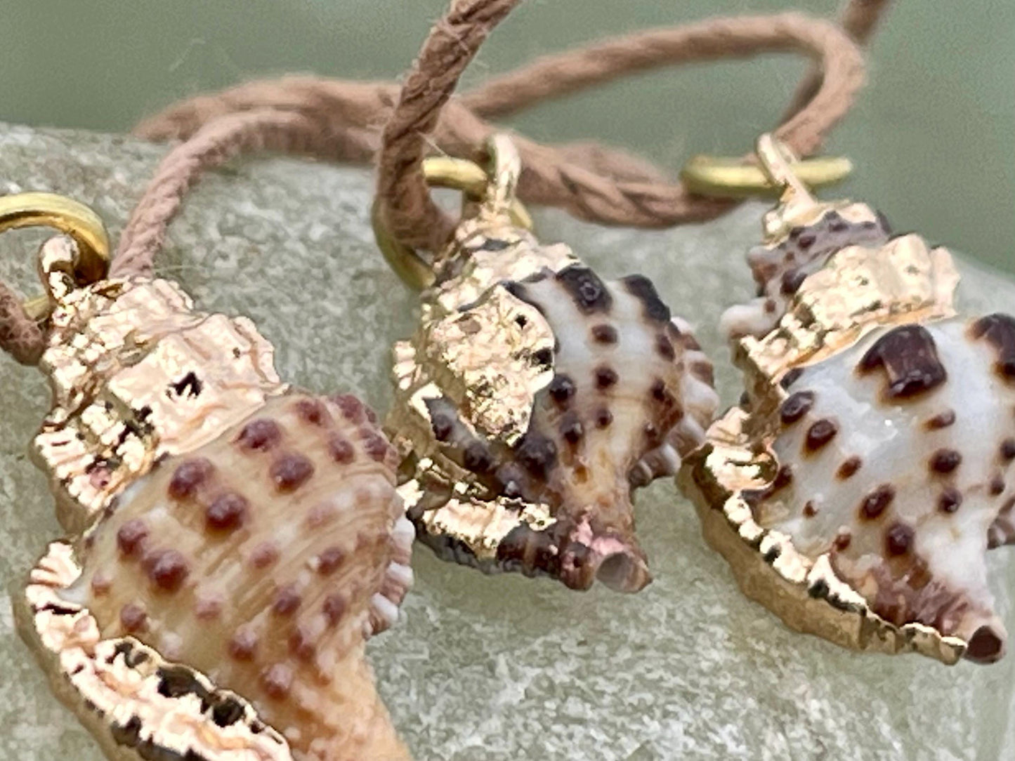 Pretty little painted gold shell necklace held on recycled brass and sustainable hemp. Shell jewellery. Boho jewellery. Eco friendly gifts.