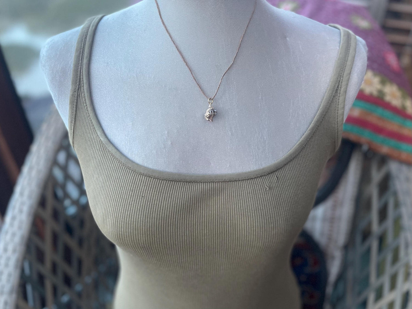 Pretty little painted gold shell necklace held on recycled brass and sustainable hemp. Shell jewellery. Boho jewellery. Eco friendly gifts.