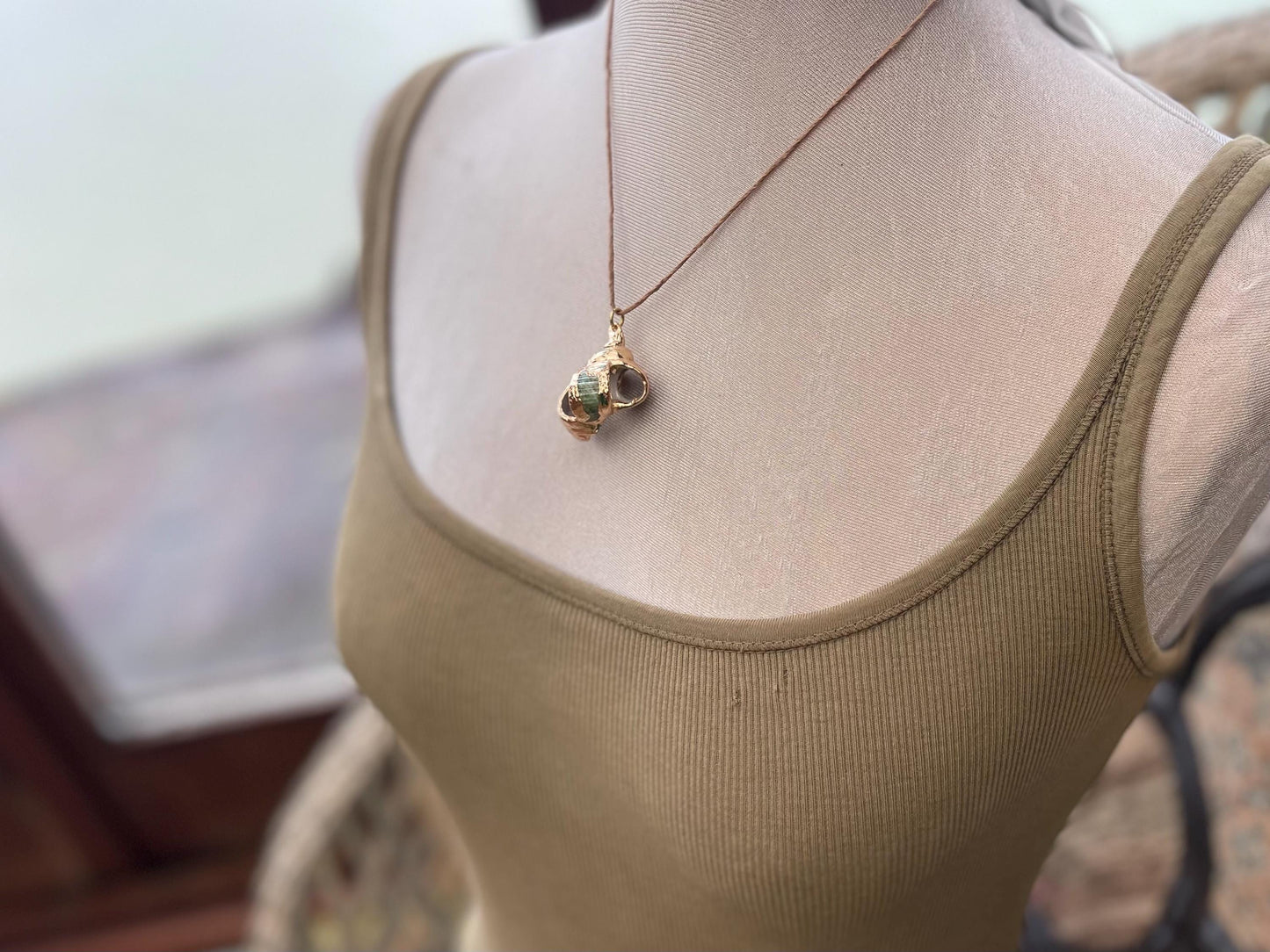 Large painted gold shell necklace held on recycled brass and sustainable hemp. Shell jewellery. Boho jewellery. Eco friendly gifts.