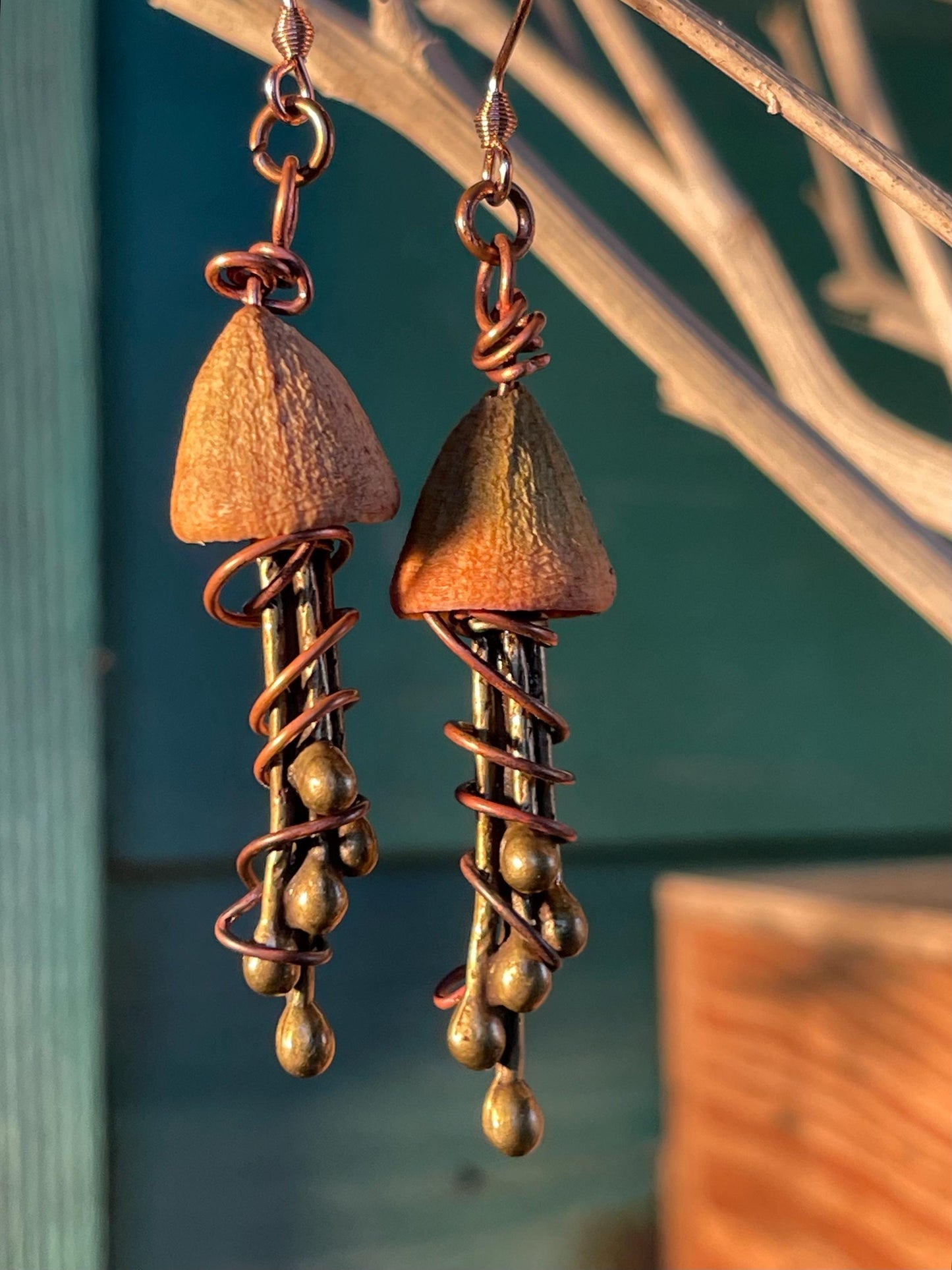 Jellyfish earrings made from recycled copper and eucalyptus seeds. Unique jellyfish jewellery. Handmade earrings. Eco friendly jewellery.