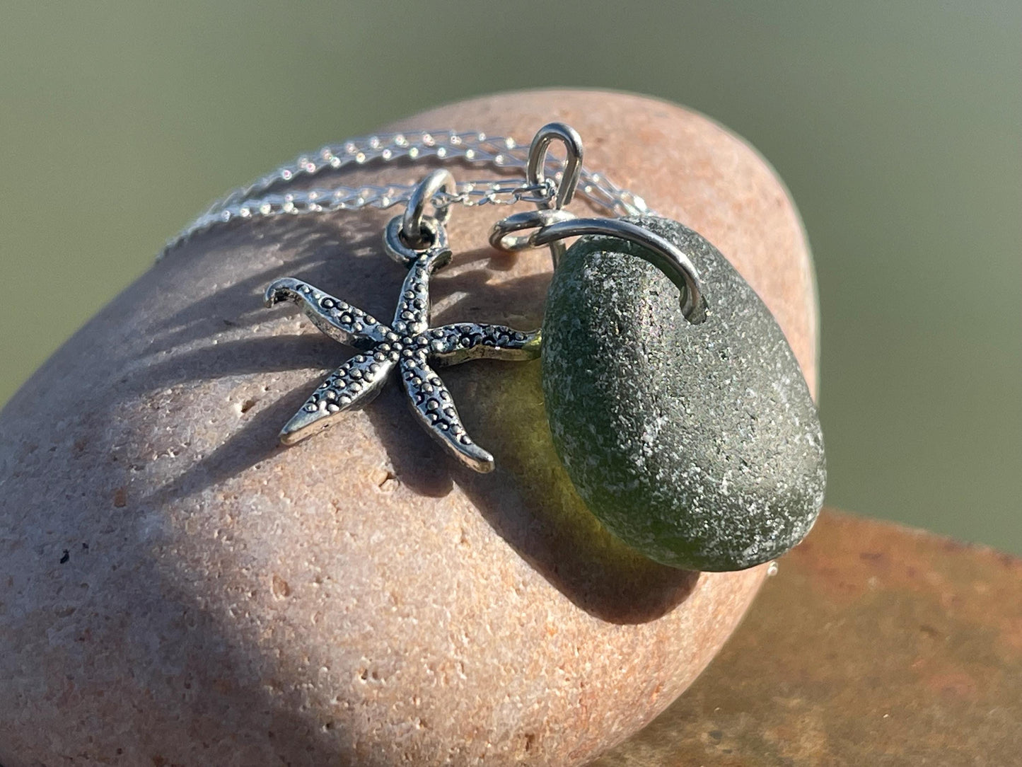 Eco friendly sea glass necklace on a sterling silver chain showcasing a little starfish. Starfish pendant,  eco friendly jewellery. Boho