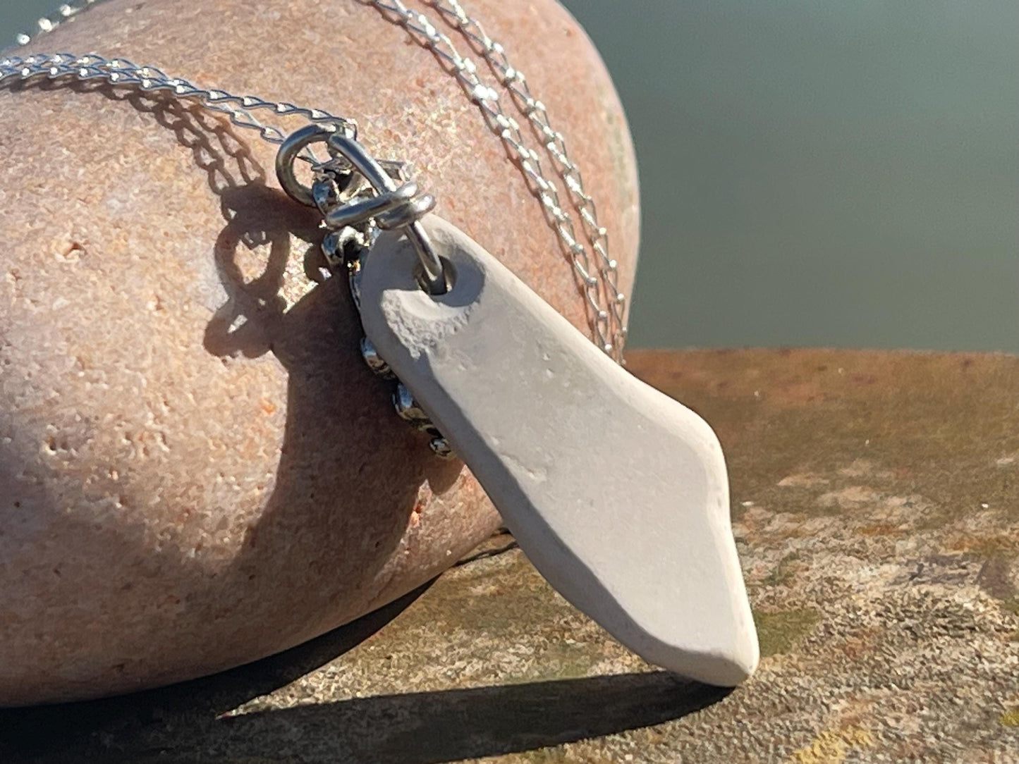 Eco friendly sea ceramic necklace on a sterling silver chain. Eco friendly jewellery, ethical jewellery. Eco friendly necklace.