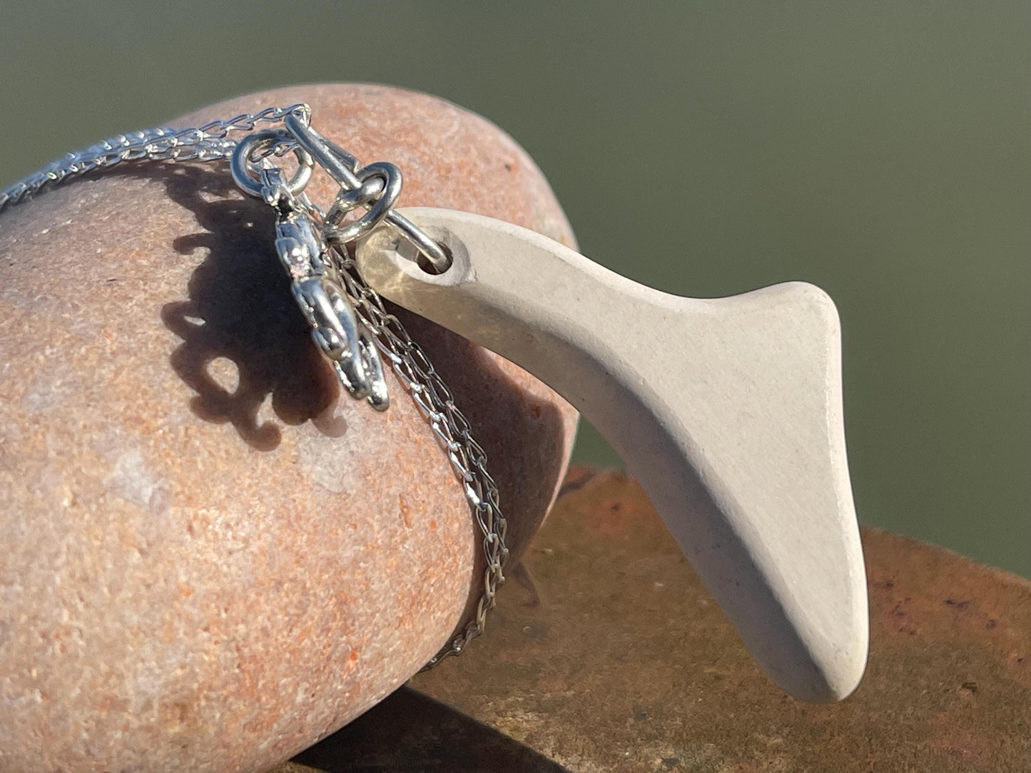 Eco friendly sea ceramic necklace on a sterling silver chain. Eco friendly jewellery, ethical jewellery. Eco friendly necklace.