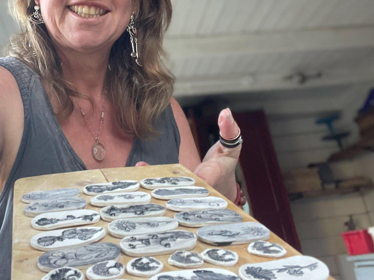 Handmade snowdrop necklace. Eco friendly jewellery. Ethical pendants made with waste clay and burnt recycled copper. Ethical jewellery.