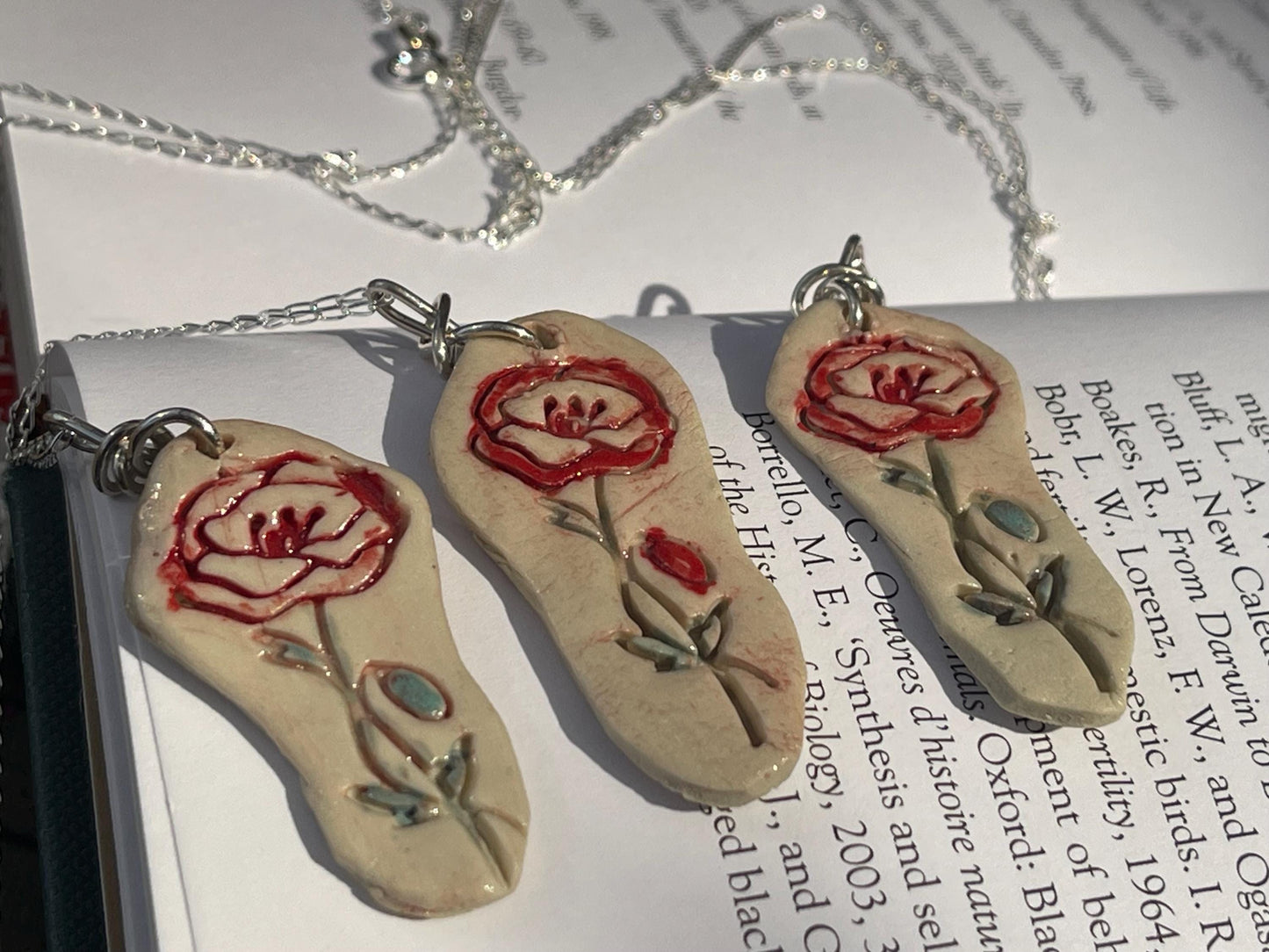 Handmade porcelain rose pendant. Eco friendly jewellery. Handmade rose necklaces on recycled sterling silver. Ethical jewellery. Eco gifts.