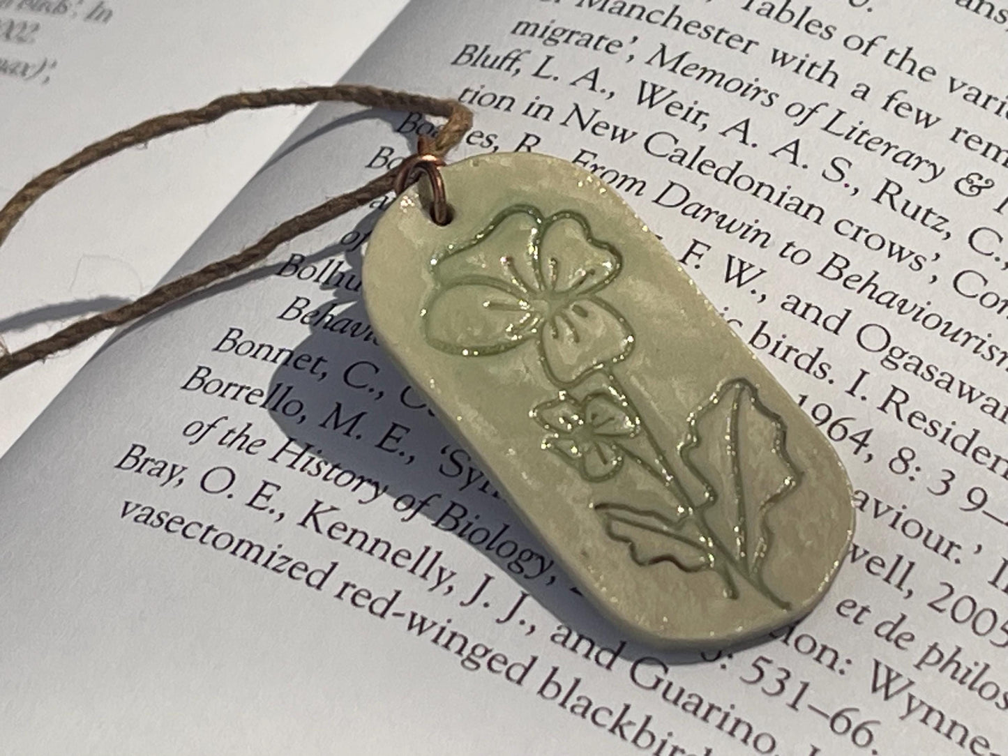 Handmade Poppy necklace. Eco friendly jewellery. Ethical pendants made with waste clay and burnt recycled copper. Ethical jewellery.