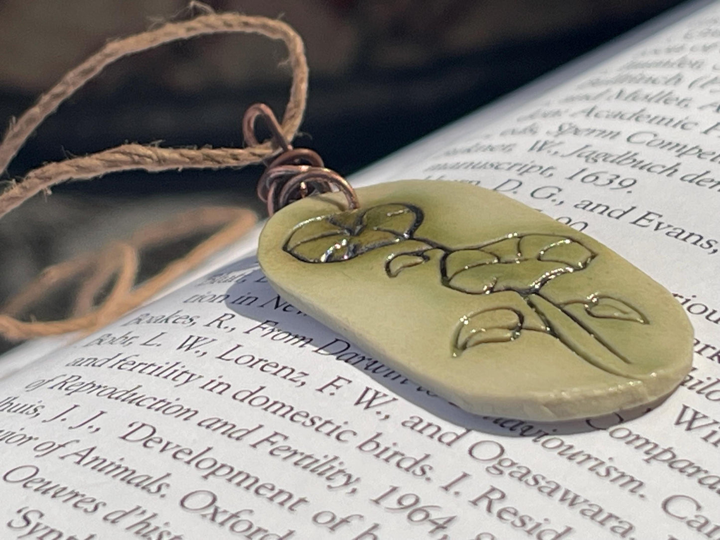 Handmade morning glory necklace. Eco friendly jewellery. Ethical pendants made with waste clay and burnt recycled copper. Ethical jewellery.