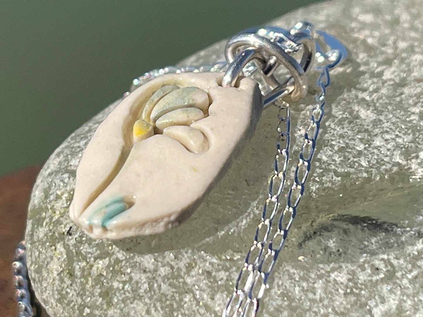 Handmade porcelain daisy pendant. Eco friendly jewellery. Handmade daisy necklaces on recycled sterling silver. Ethical jewellery. Eco gifts.