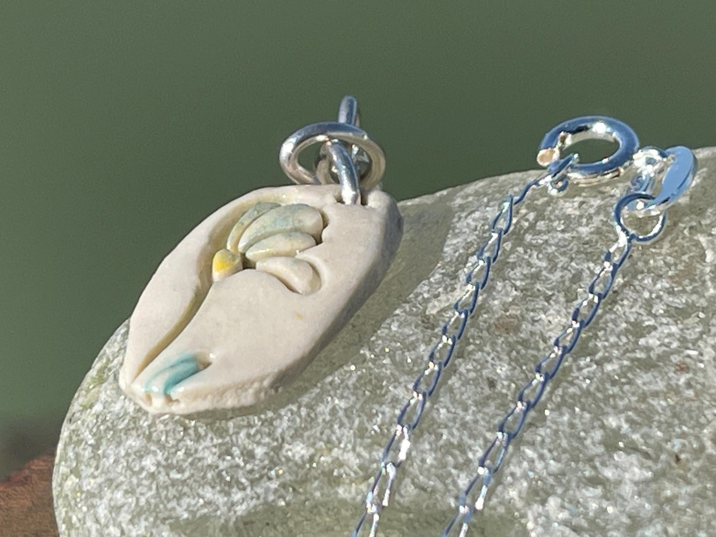 Handmade porcelain daisy pendant. Eco friendly jewellery. Handmade daisy necklaces on recycled sterling silver. Ethical jewellery. Eco gifts.